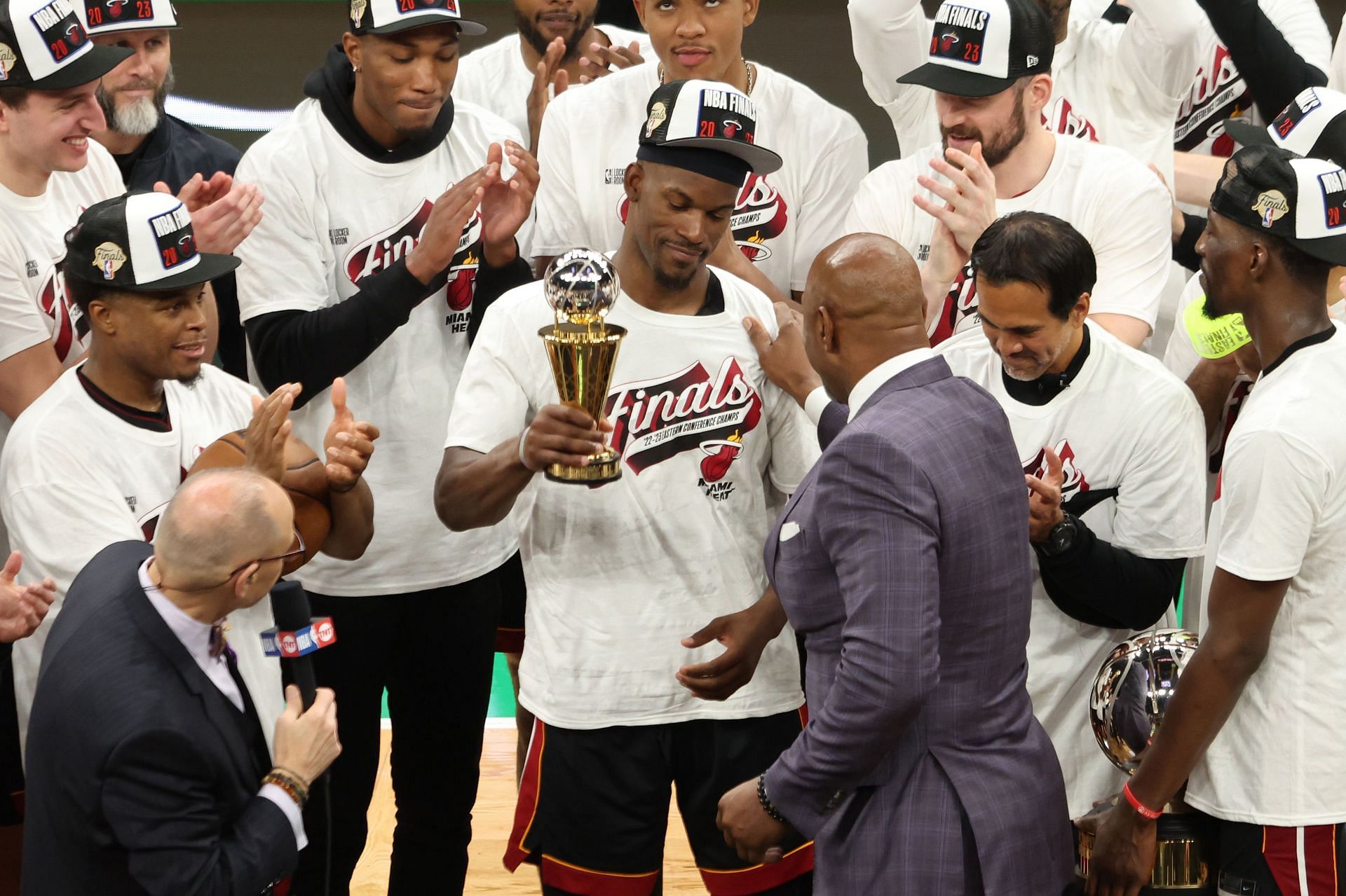 Jimmy Butler of the Miami Heat holding the Larry Bird Eastern Conference Finals MVP trophy.