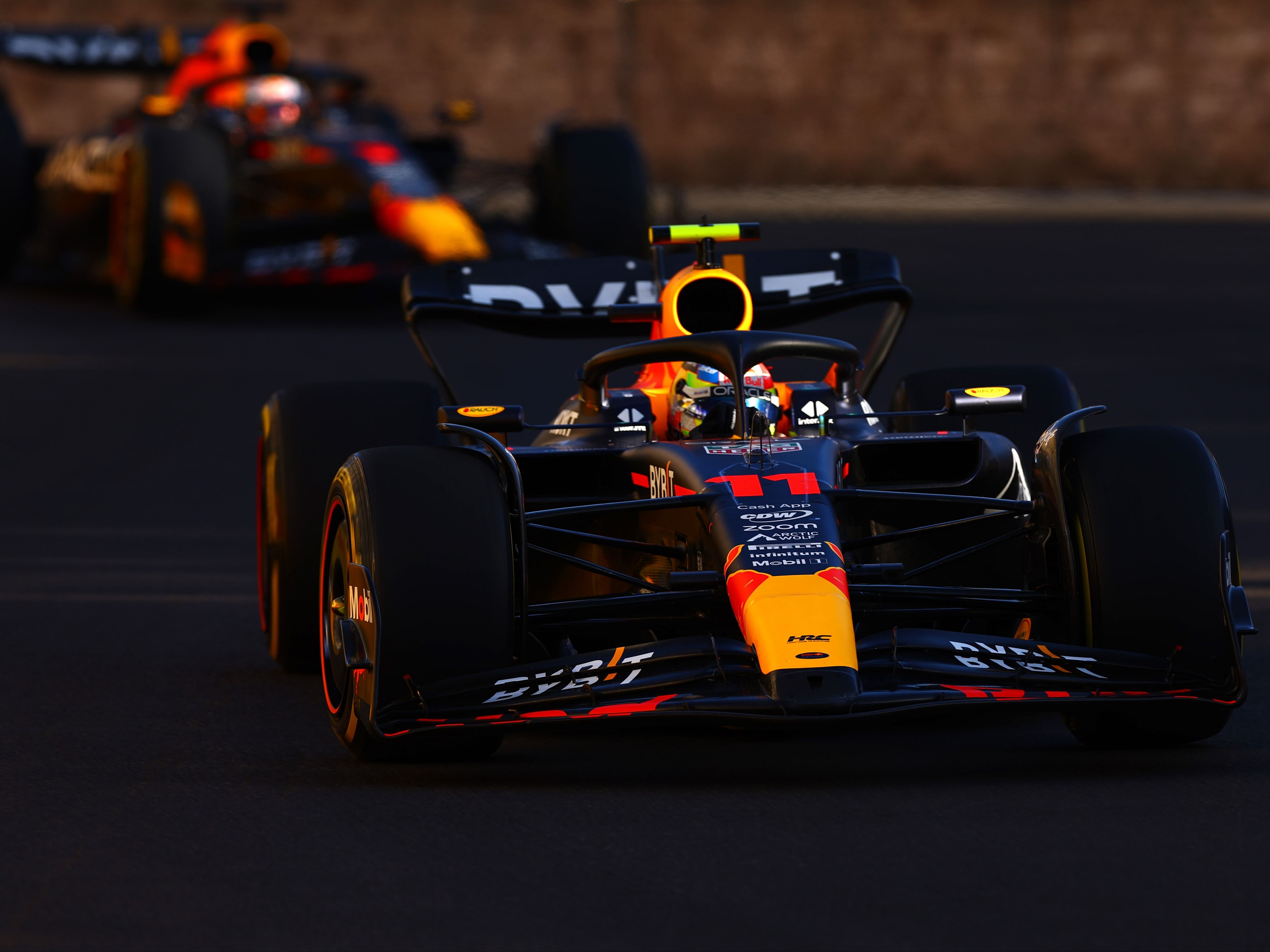 Sergio Perez (11) and Max Verstappen (1) during the Sprint Shootout/Sprint race ahead of the 2023 F1 Azerbaijan Grand Prix. (Photo by Alex Pantling/Getty Images)
