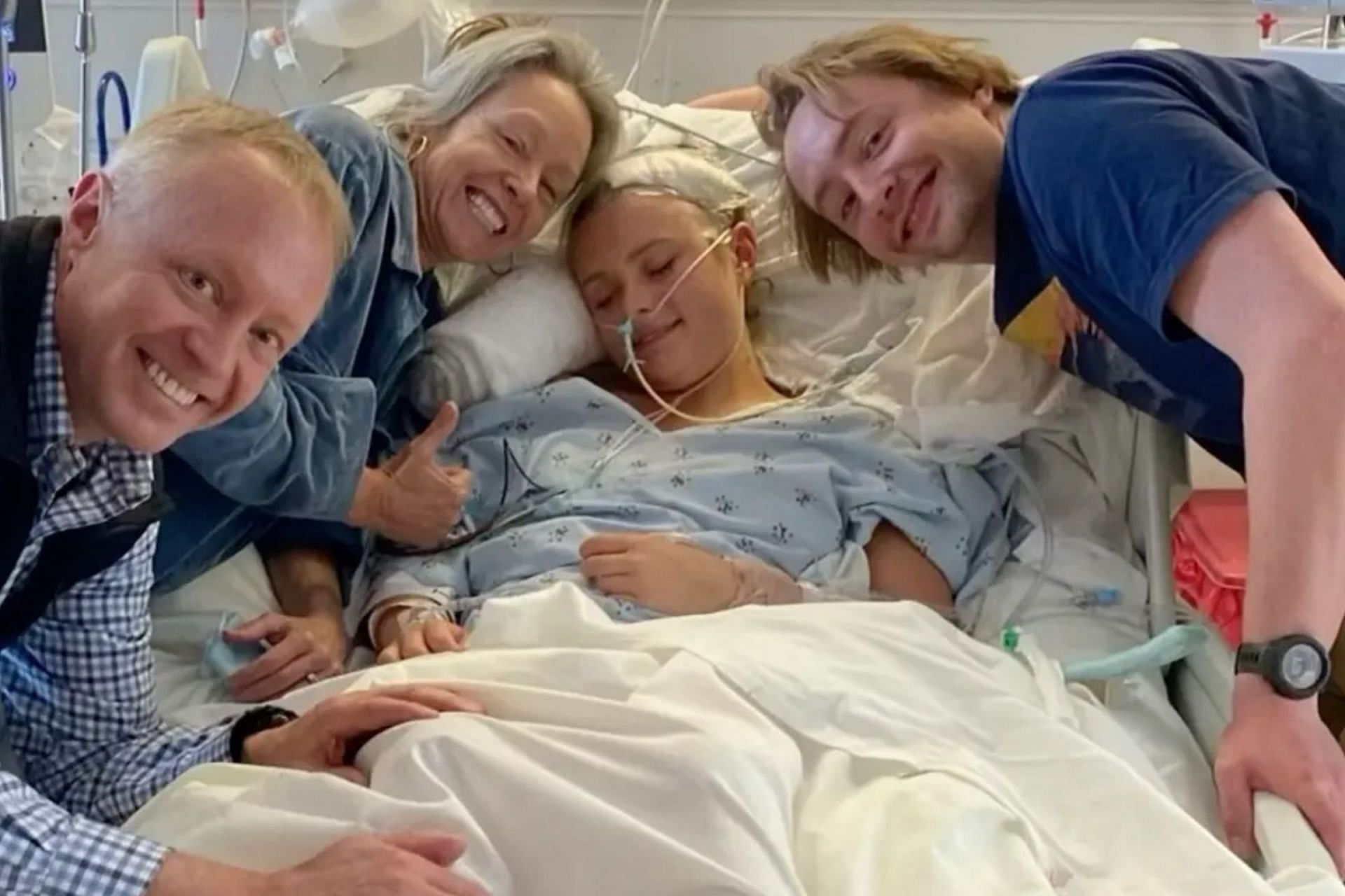 Burke with her family at the hospital (Image via Family handout)