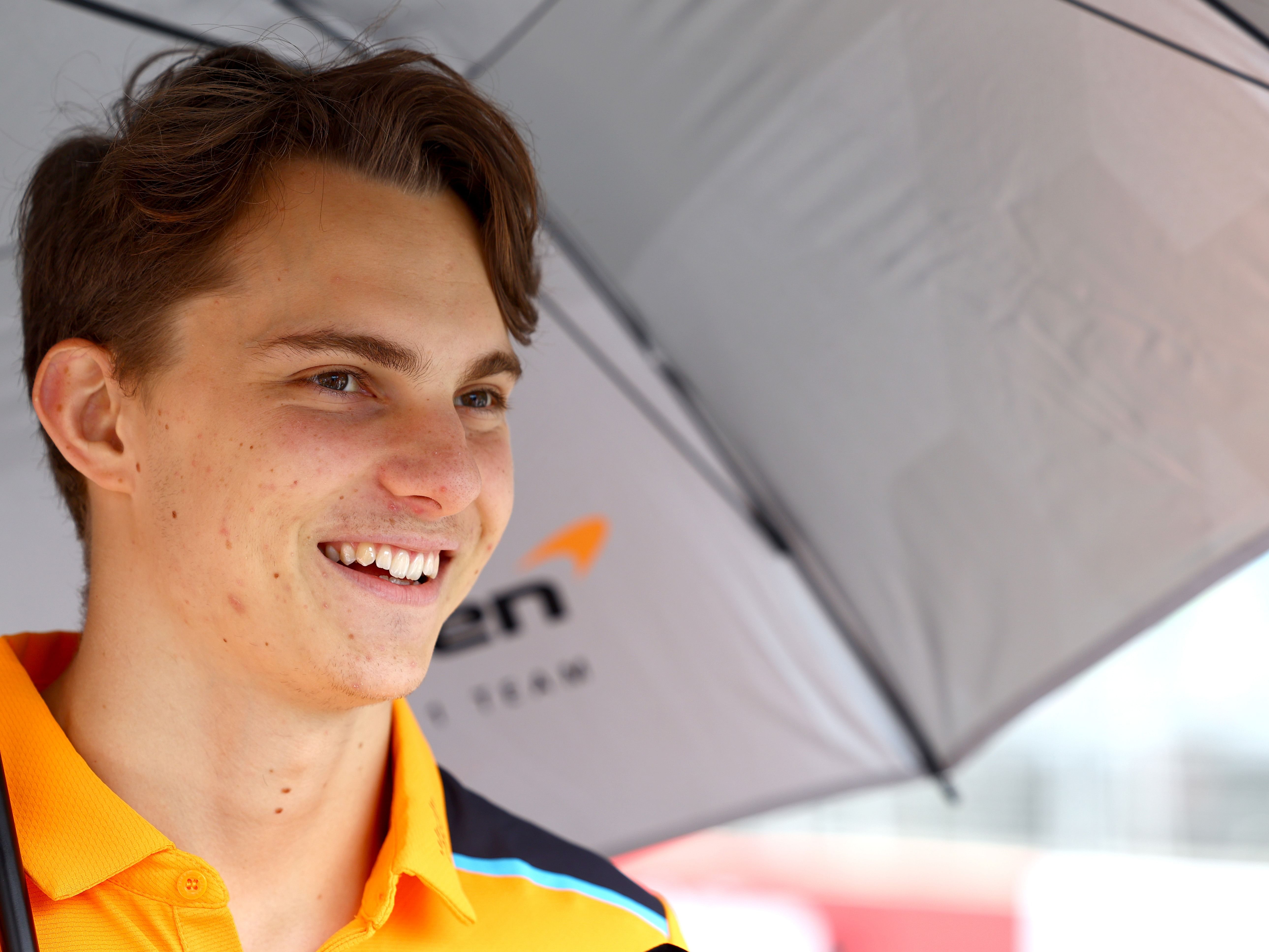 Oscar Piastri looks on in the paddock prior to the 2023 F1 Azerbaijan Grand Prix. (Photo by Mark Thompson/Getty Images)