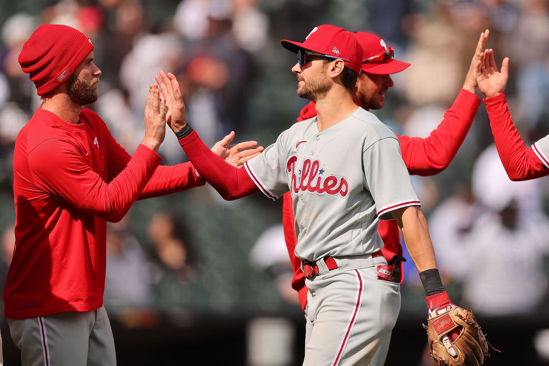 Bryce Harper participates in postgame high-fives after a recent win