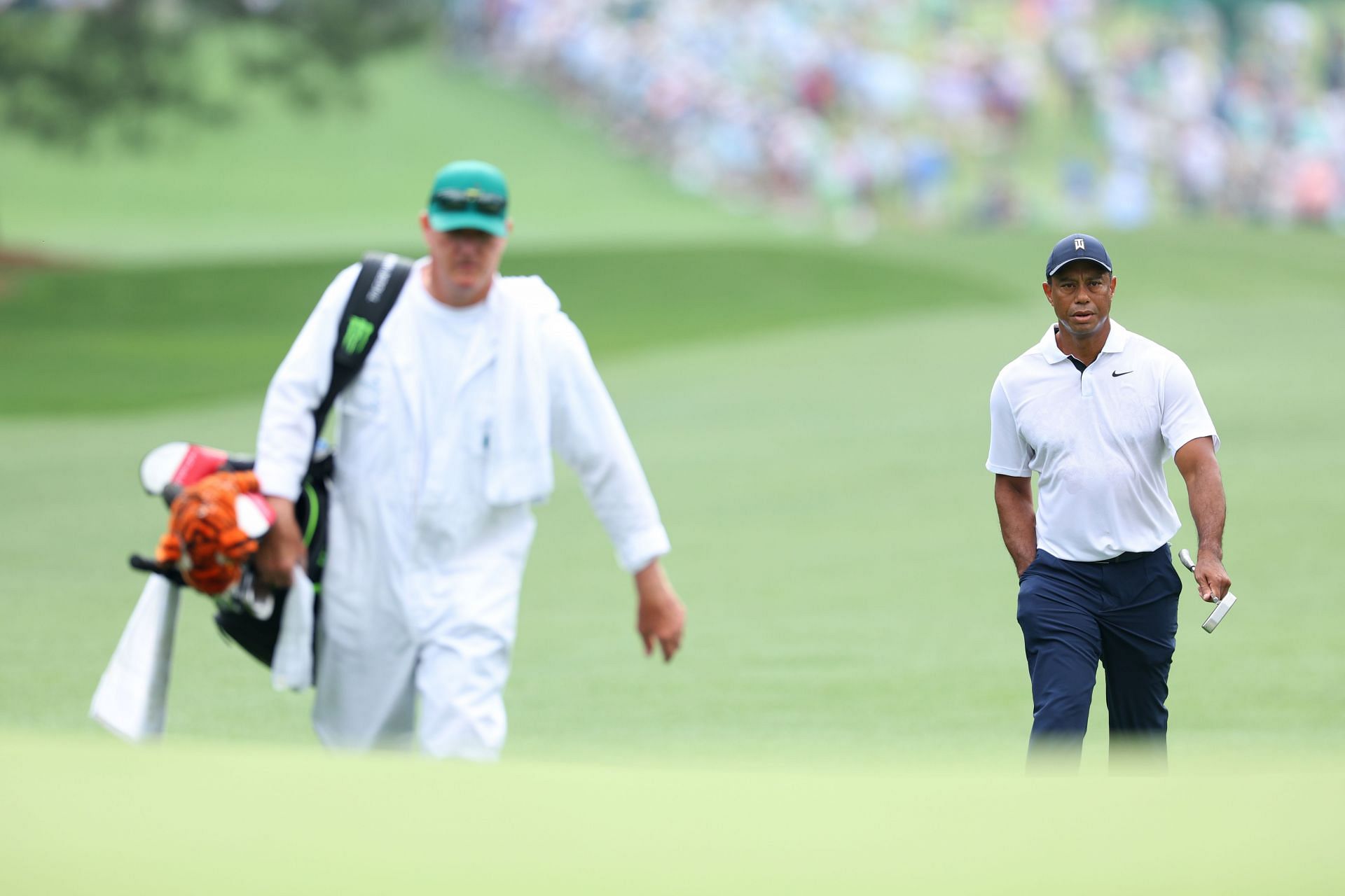 Tiger Woods and Joe LaCava during The Masters