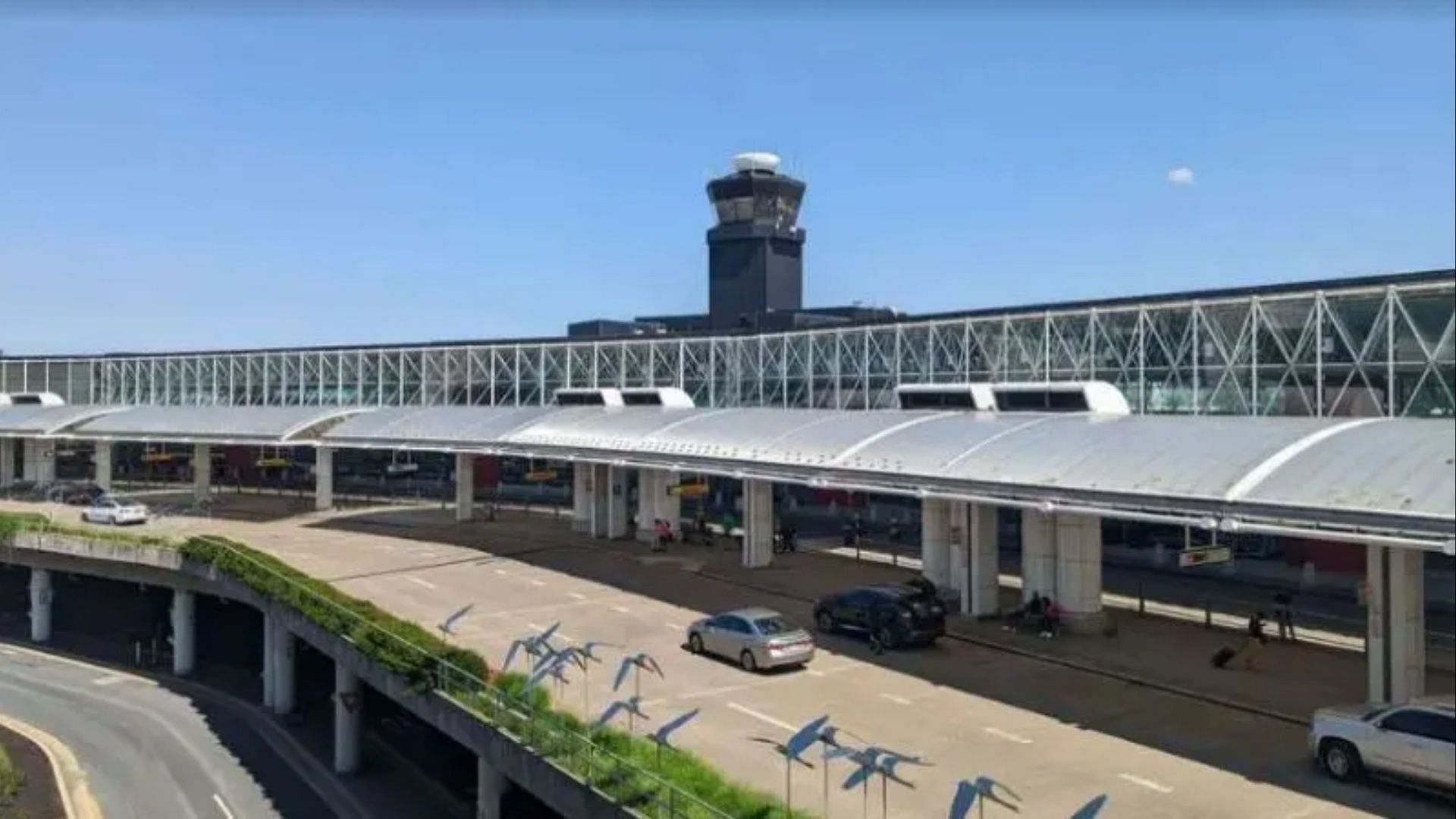 White woman cries over too many Black people at Baltimore/Washington International Airport. (Image via Shutterstock)