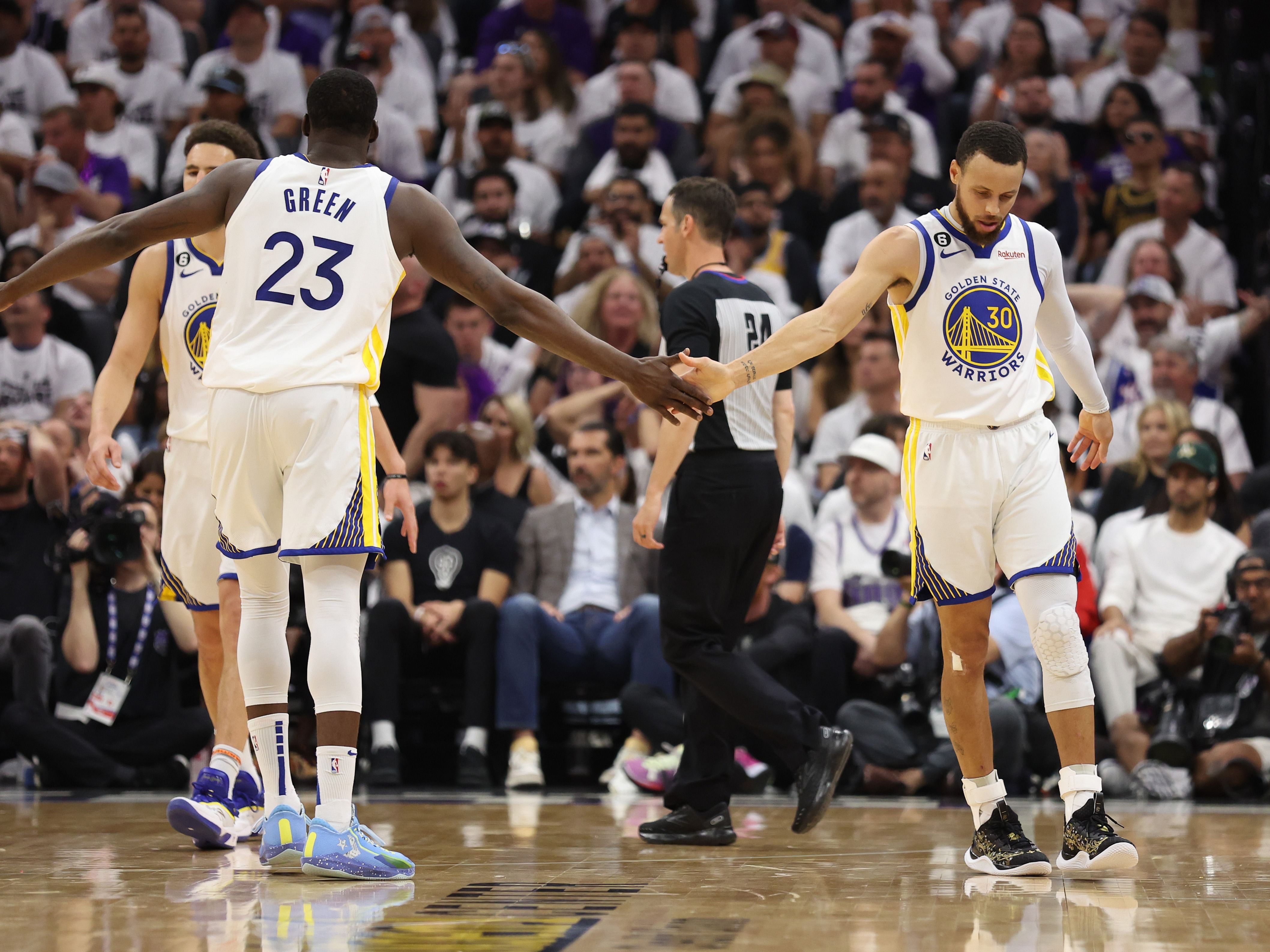 Steph Curry and Draymond Green during Golden State Warriors v Sacramento Kings - Game Seven