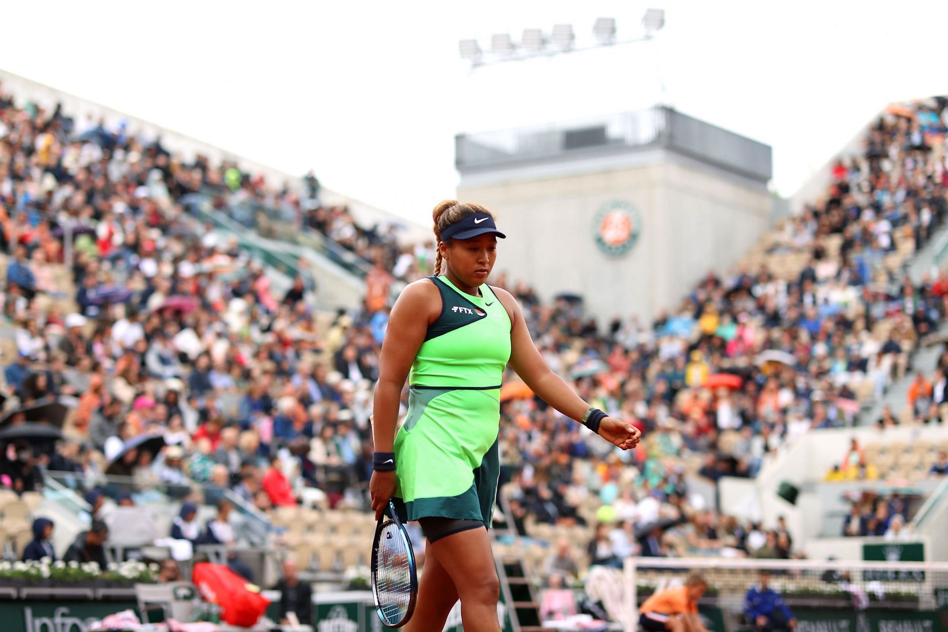 Naomi Osaka in her green outfit at the 2022 French Open - Day Two
