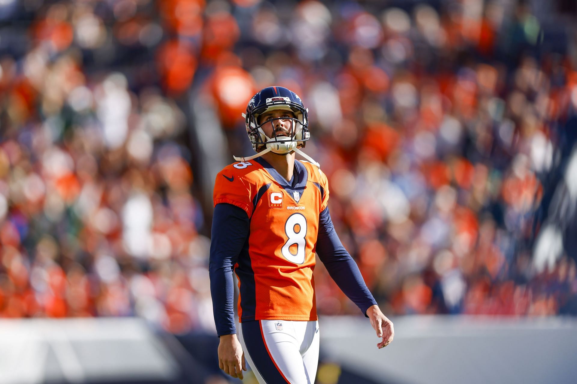 Brandon McManus of the Denver Broncos reacts after missing a 56-yard field goal attempt