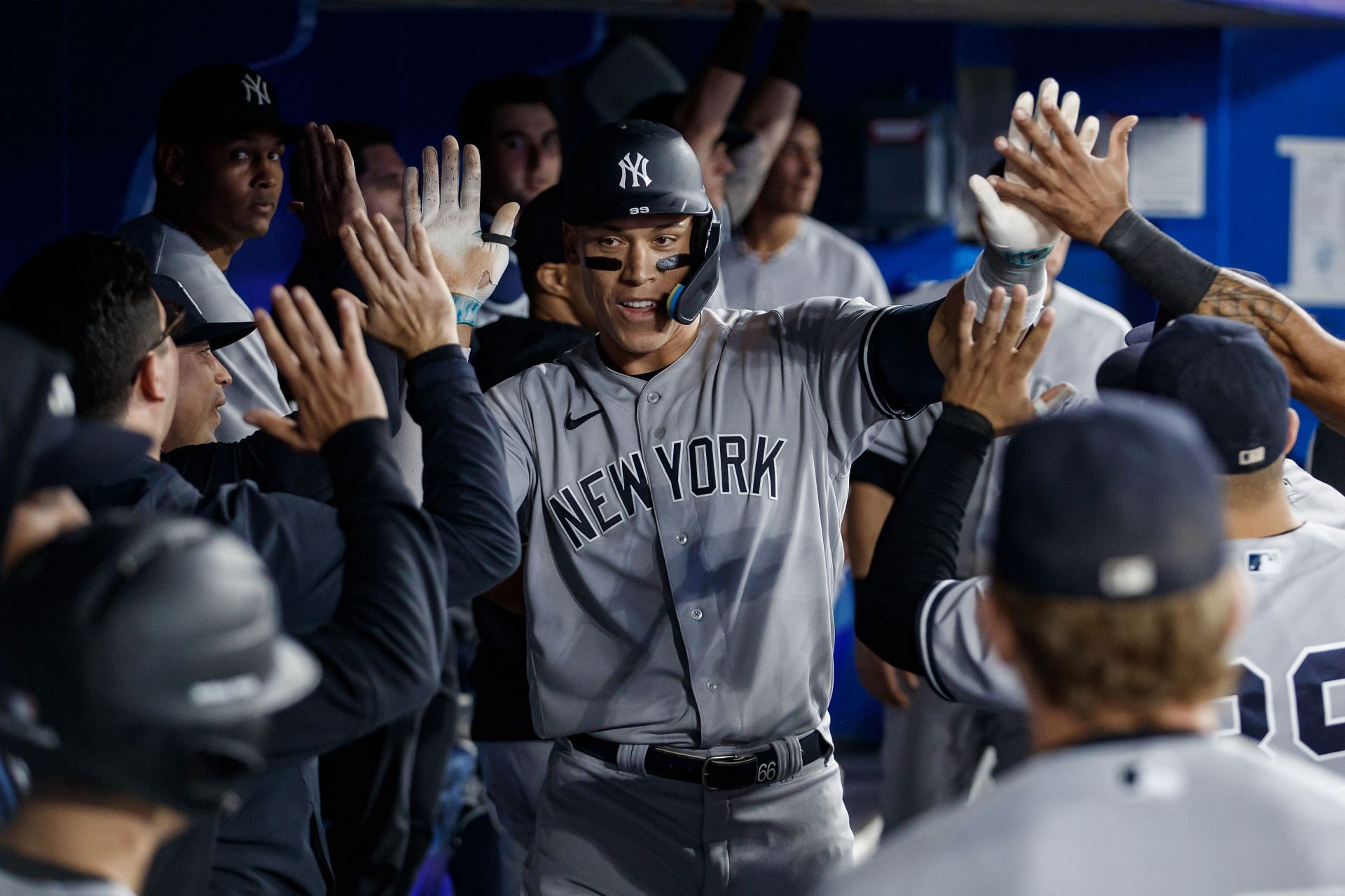 Aaron Judge of the New York Yankees celebrates a solo home run.