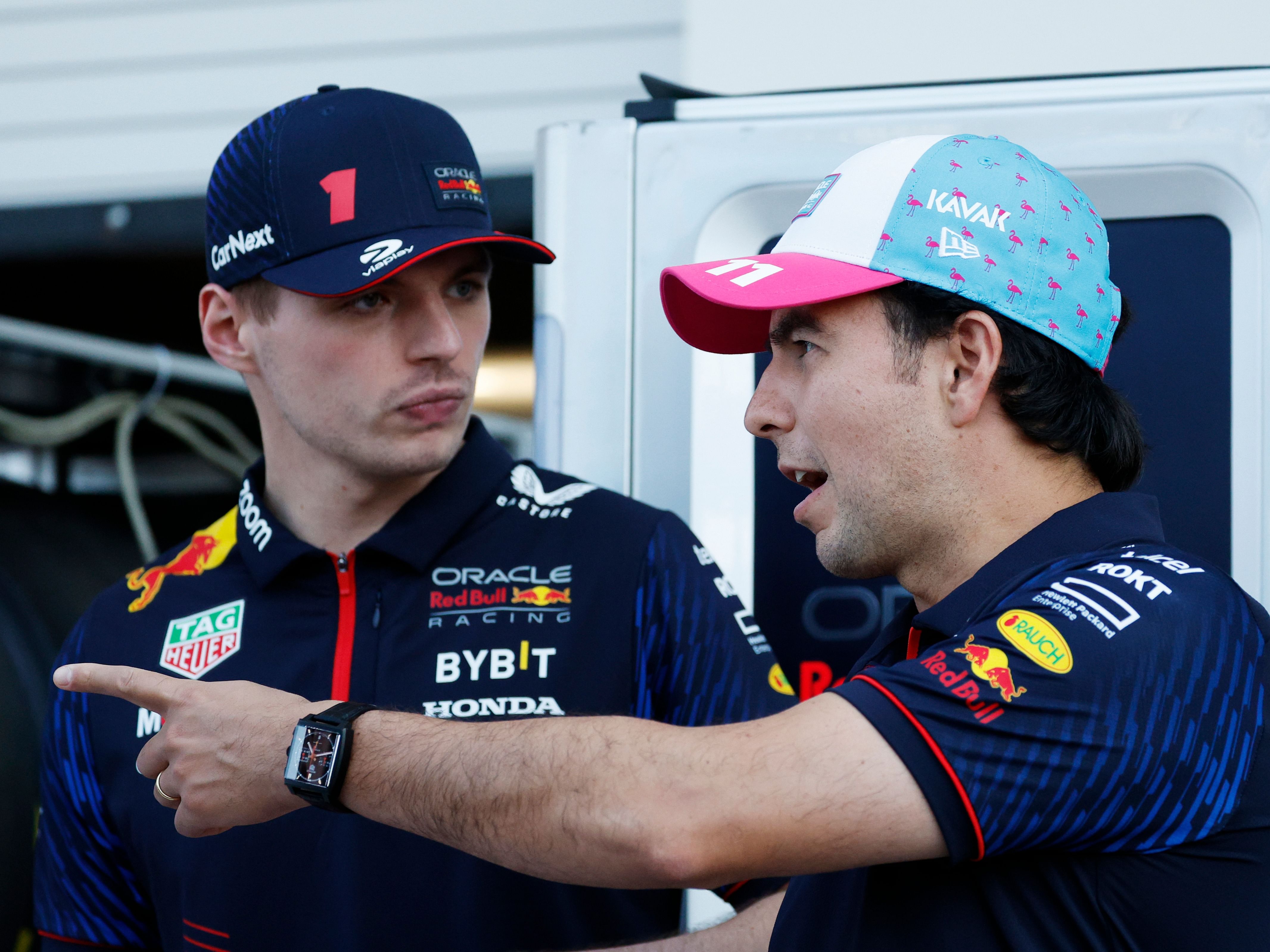Sergio Perez and Max Verstappen talk during previews ahead of the 2023 F1 Miami Grand Prix (Photo by Chris Graythen/Getty Images)