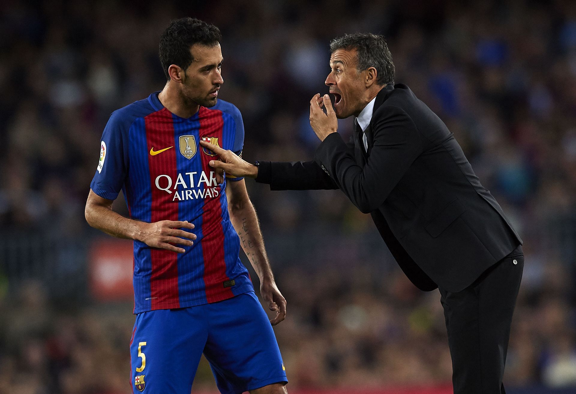 Luis Enrique (right) branded Busquets (left) as best midfielder in the world.