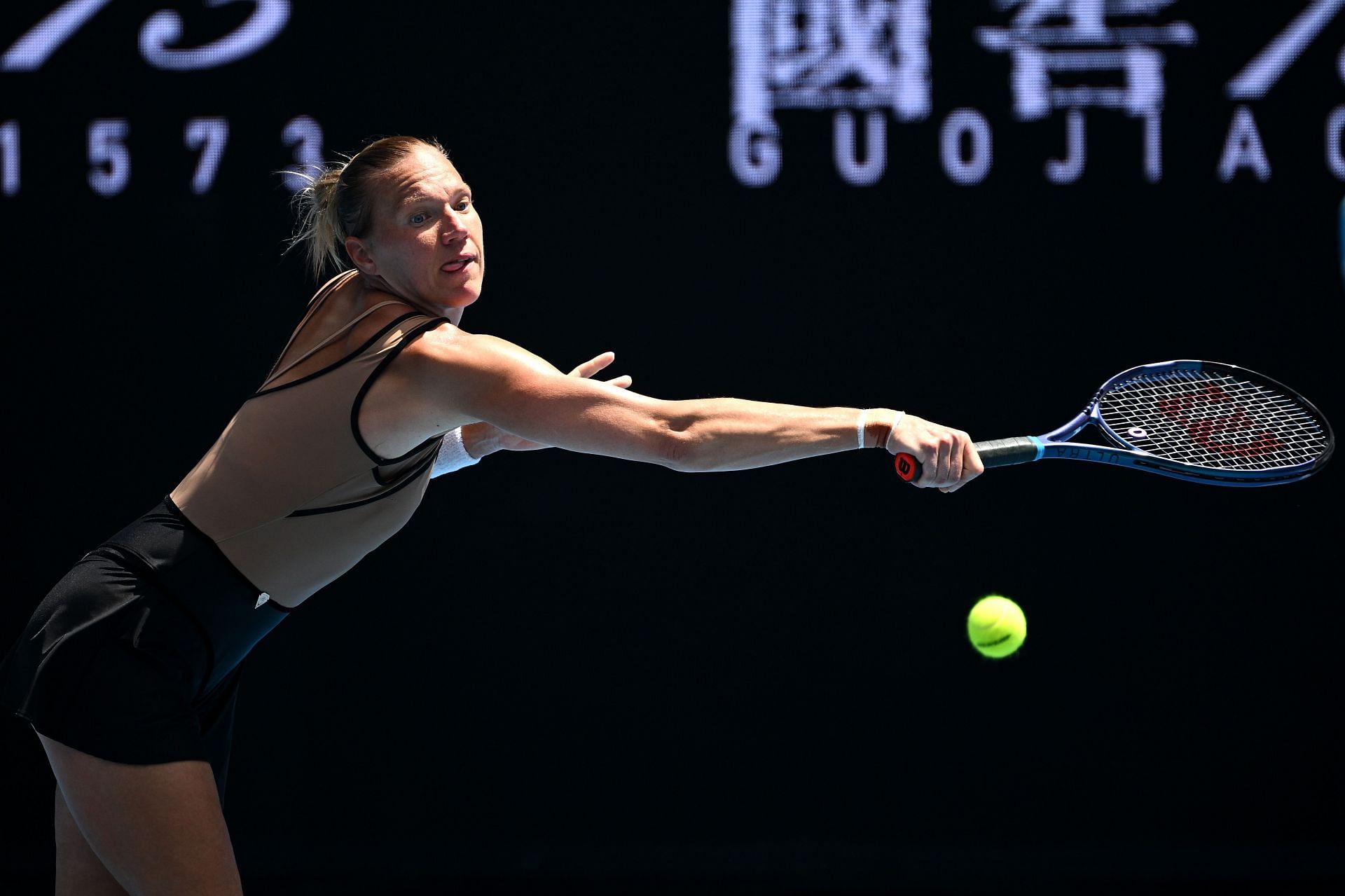 Kanepi tries to reach the ball at the 2023 Australian Open