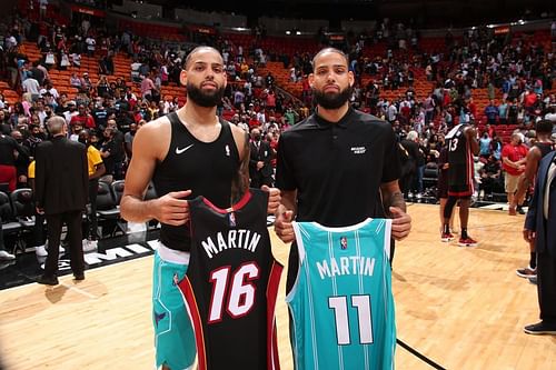 Charlotte Hornets wing Cody Martin and Miami Heat wing Caleb Martin