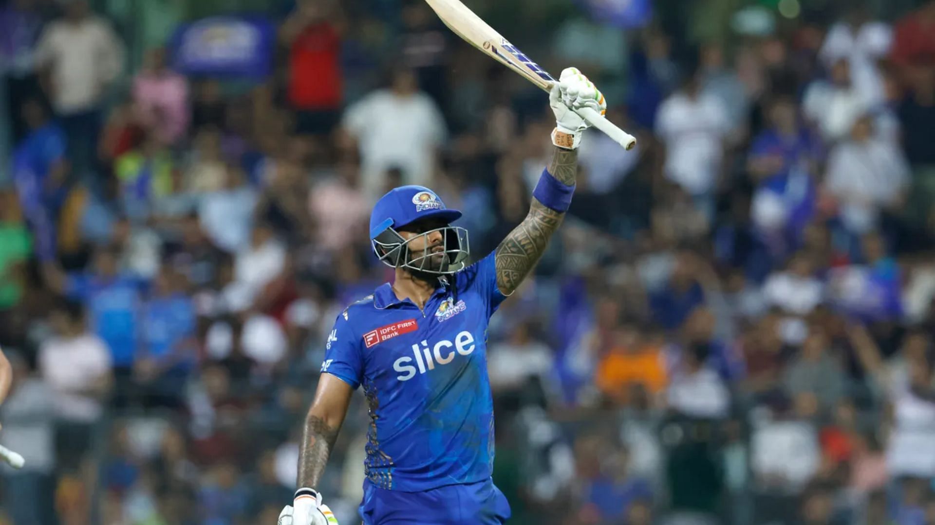 Suryakumar Yadav celebrates after reaching his half-century against RCB (P.C.;iplt20.com)