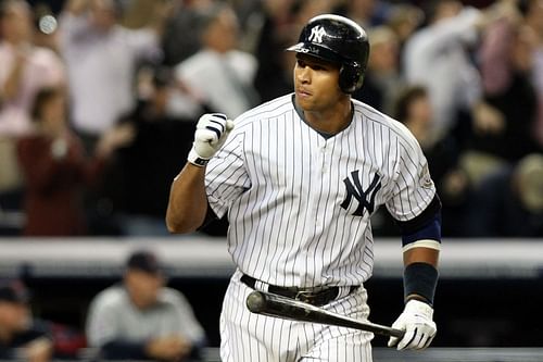 Minnesota Twins v New York Yankees, Game 2: NEW YORK - OCTOBER 09: Alex Rodriguez (13) of the New York Yankees celebrates after hitting a two-run home run in the ninth inning against the Minnesota Twins in Game Two of the ALDS during the 2009 MLB Playoffs at Yankee Stadium on October 9, 2009, in the Bronx borough of New York City. (Photo by Nick Laham/Getty Images)