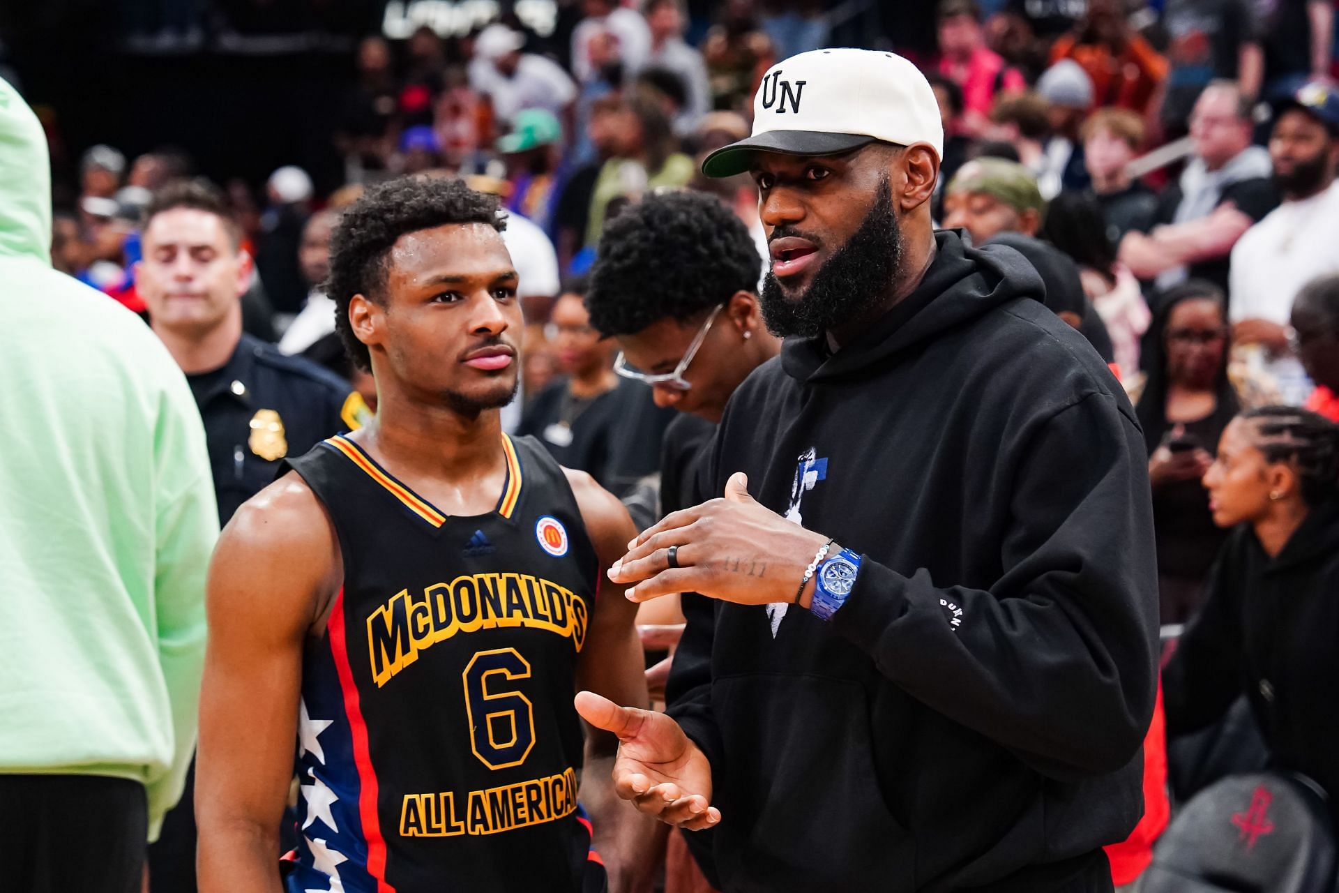 Bronny James, left, and LeBron James in the 2023 McDonald&#039;s All-American Game.