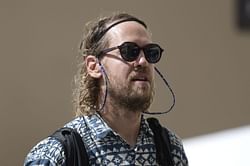 “He is walking like he never left”: F1 fans react as Sebastian Vettel arrives for the 2023 Monaco GP
