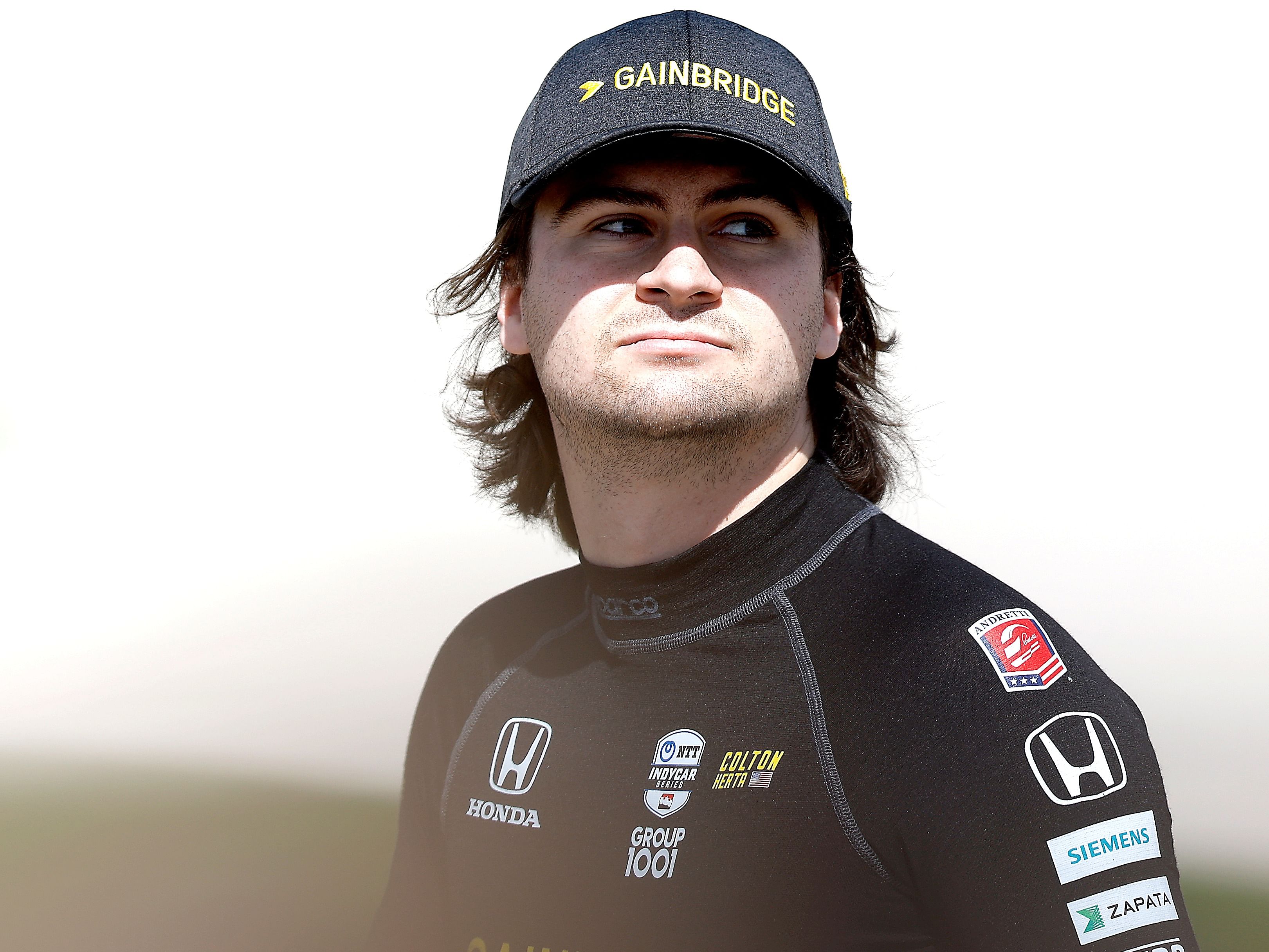 Colton Herta, driver of the #26 Gainbridge Honda, looks on during qualifying for the NTT IndyCar Series PPG 375 - Practice at Texas Motor Speedway on April 01, 2023 in Fort Worth, Texas. (Photo by Sean Gardner/Getty Images)