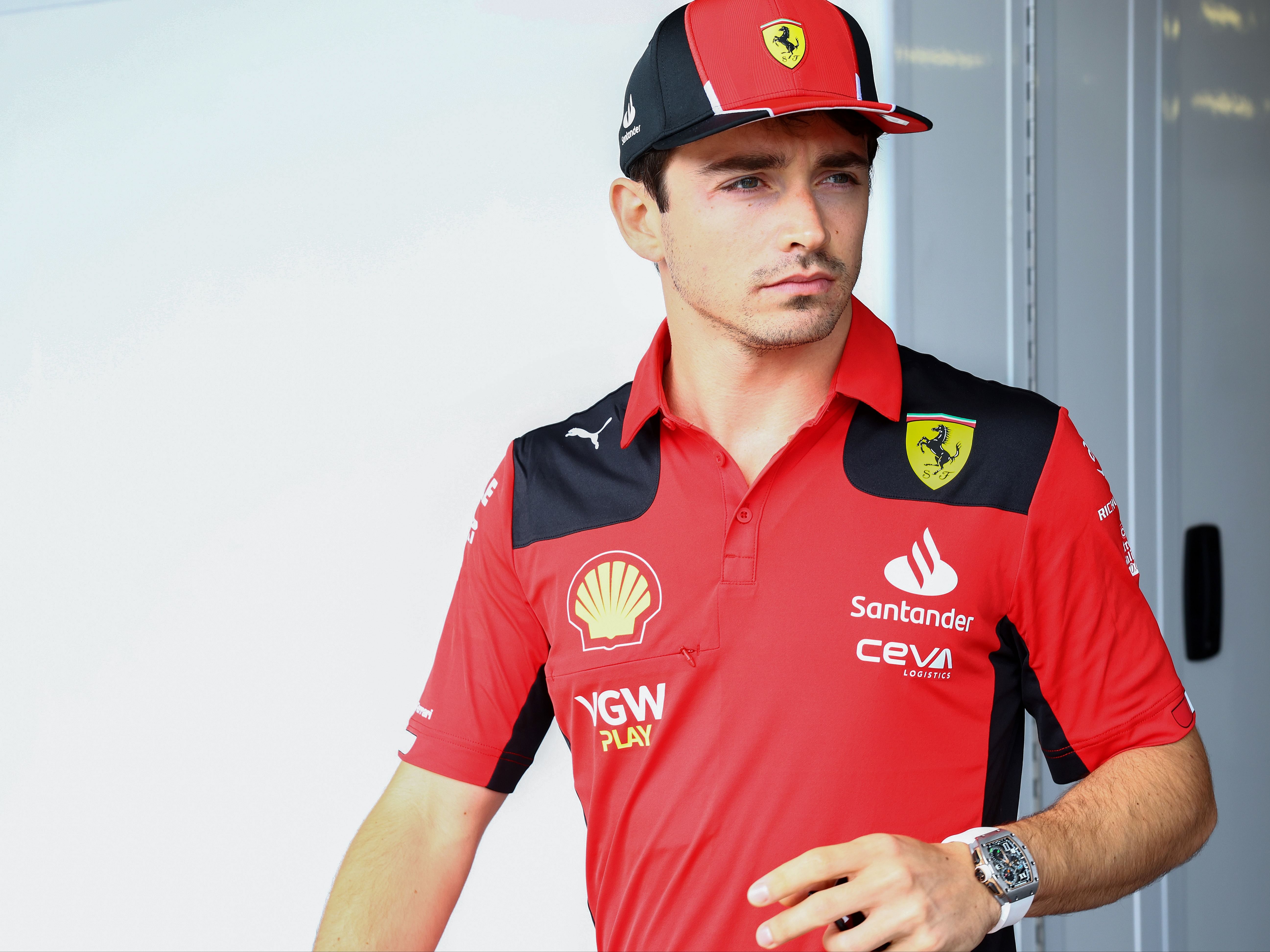 Charles Leclerc looks on in the paddock prior to the 2023 F1 Azerbaijan Grand Prix. (Photo by Mark Thompson/Getty Images)