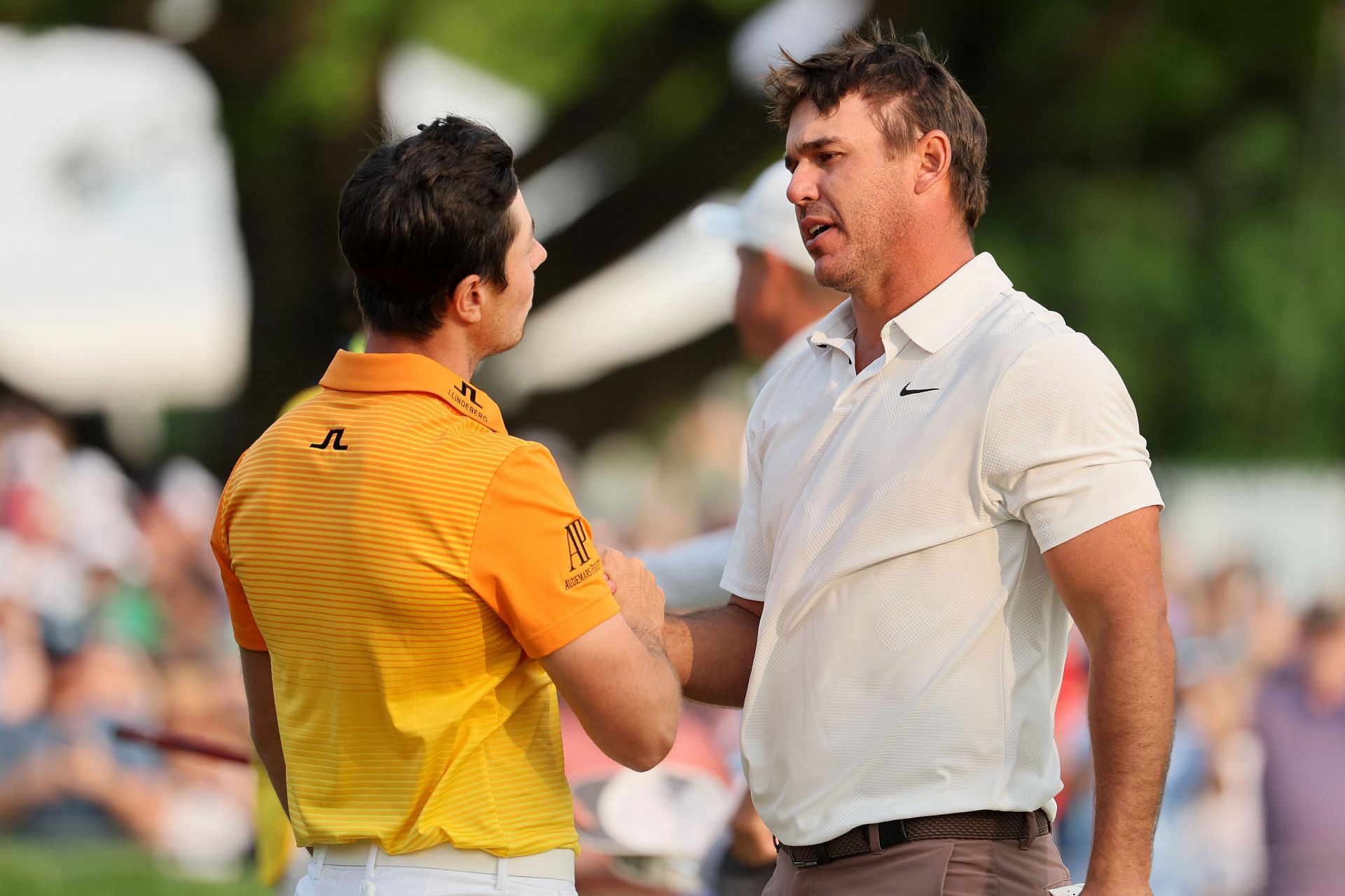 Viktor Hovland congratulates Koepka for his win at the 2023 PGA Championship