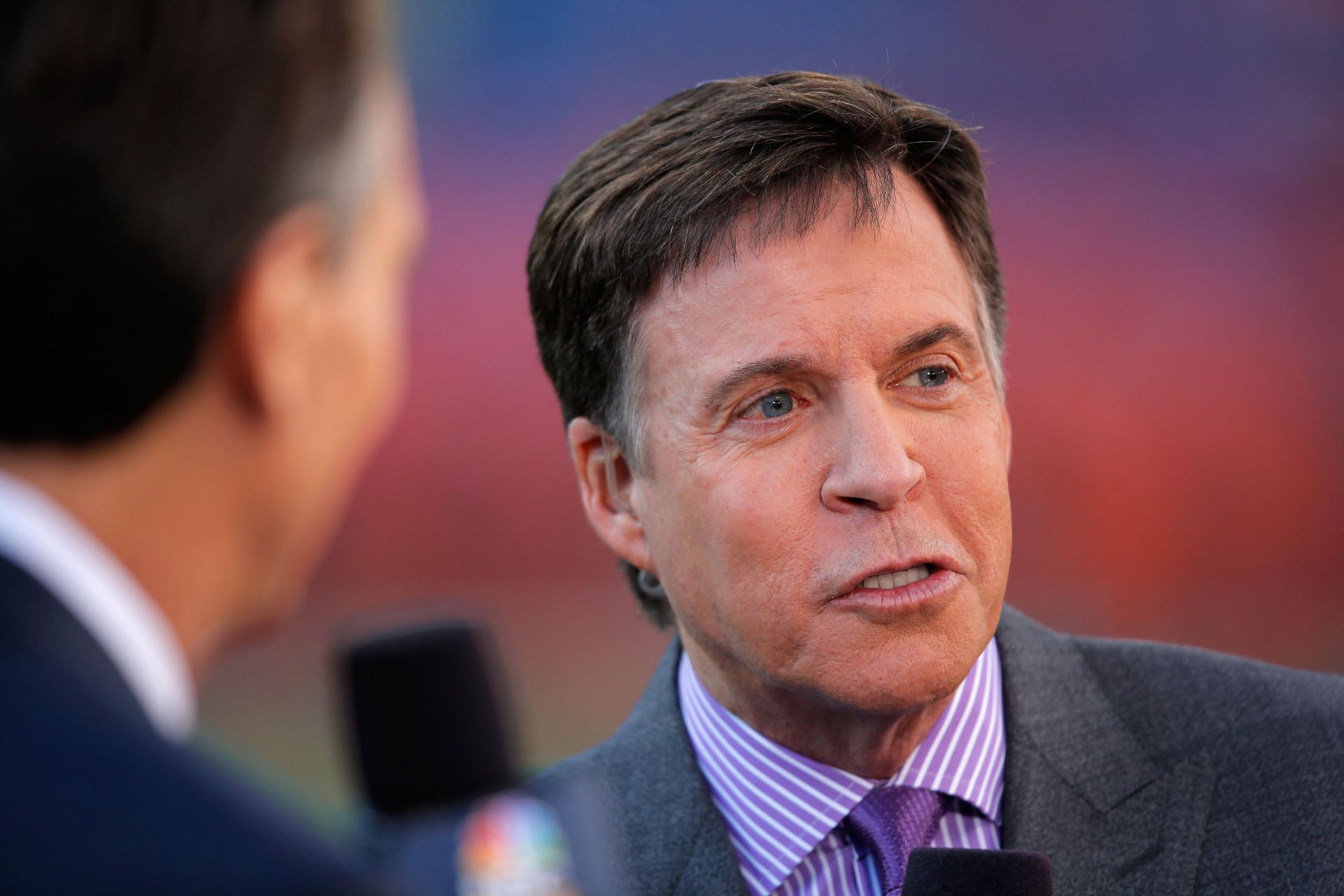 Bob Costas of NBC Sports comentates as the San Francisco 49ers face the Denver Broncos at Sports Authority Field at Mile High on October 19, 2014 in Denver, Colorado.