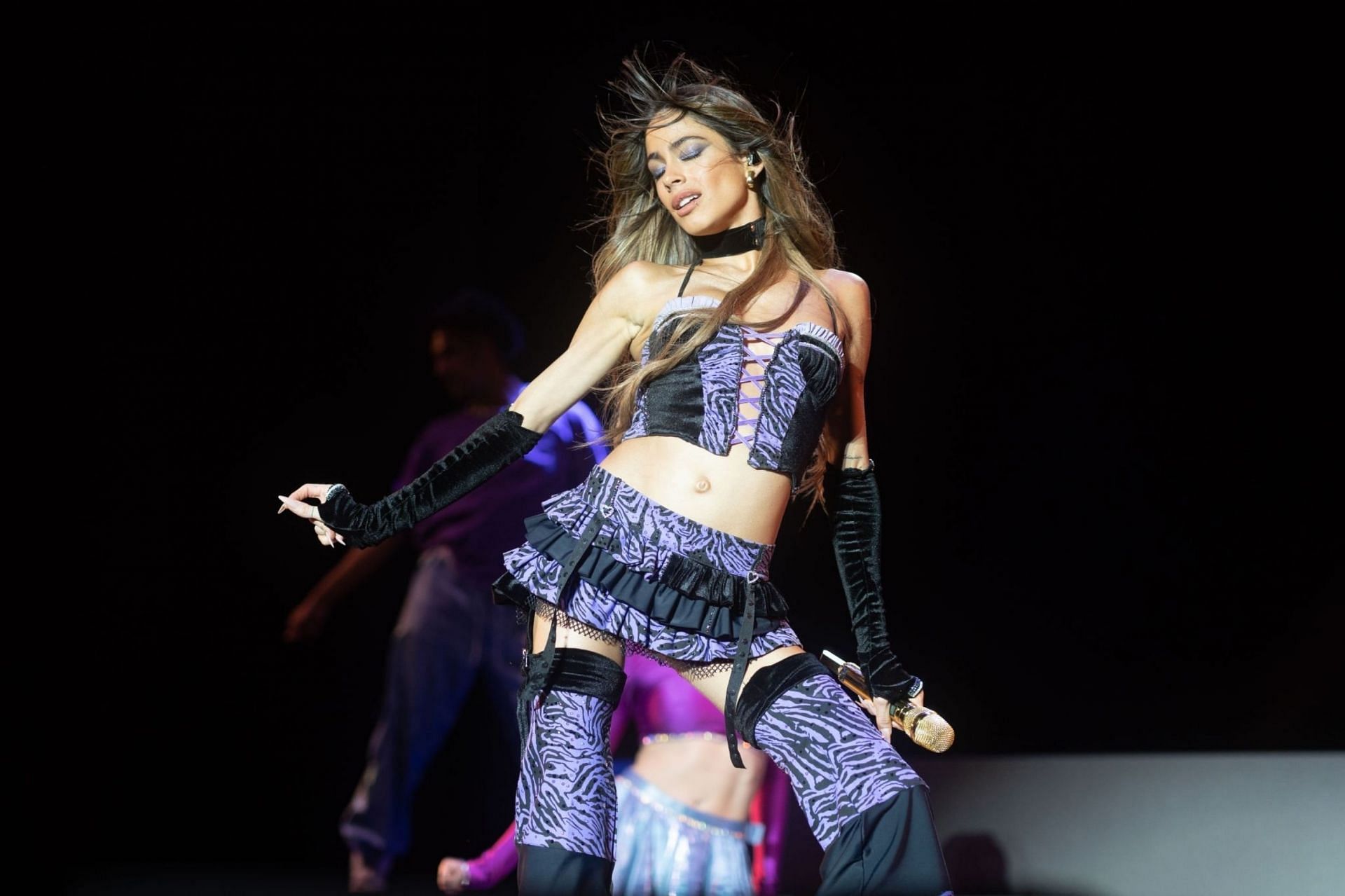 Argentine singer Tini Stoessel performs on stage during a concert at Estadio Centenario on October 7, 2022 in Montevideo, Uruguay(Image via Getty Images)