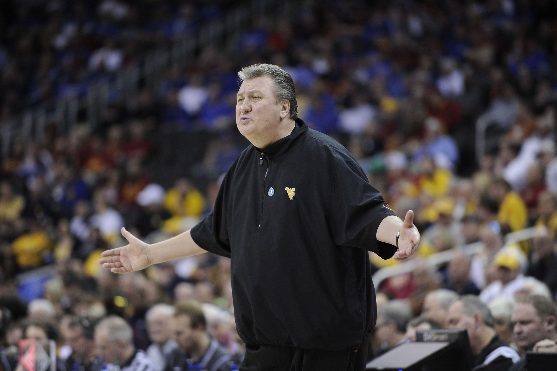 Bob Huggins&#039; salary cut by $1M after homophobic comments