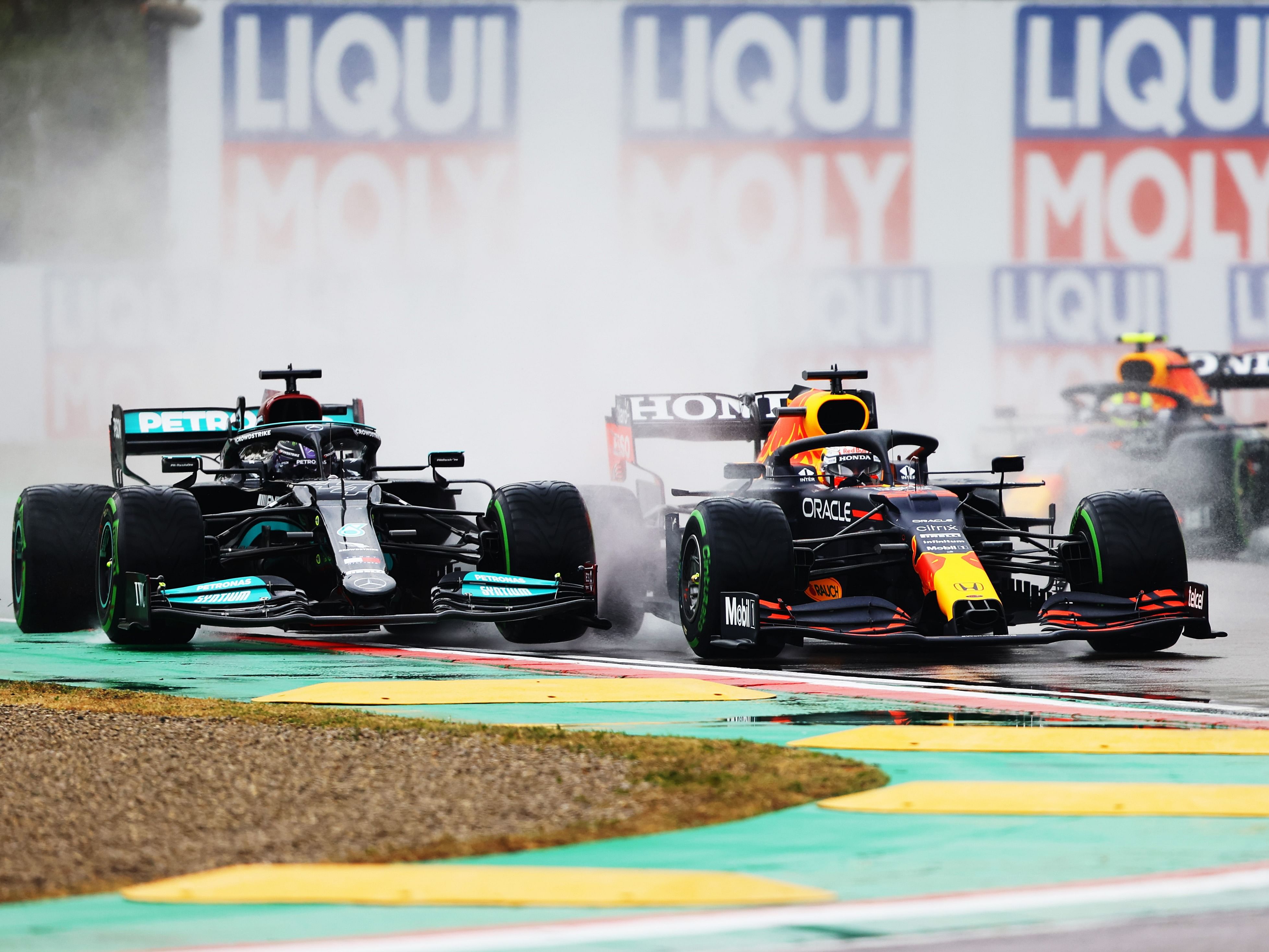 Lewis Hamilton (44) and Max Verstappen (33) at the start of the 2021 F1 Emilia Romagna Grand Prix. (Photo by Bryn Lennon/Getty Images)