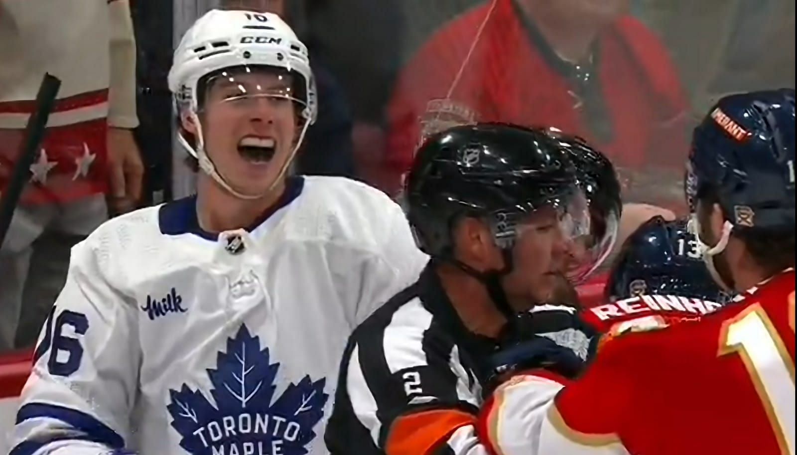 Mitch Marner laughs after getting punched by Matthew Tkachuk