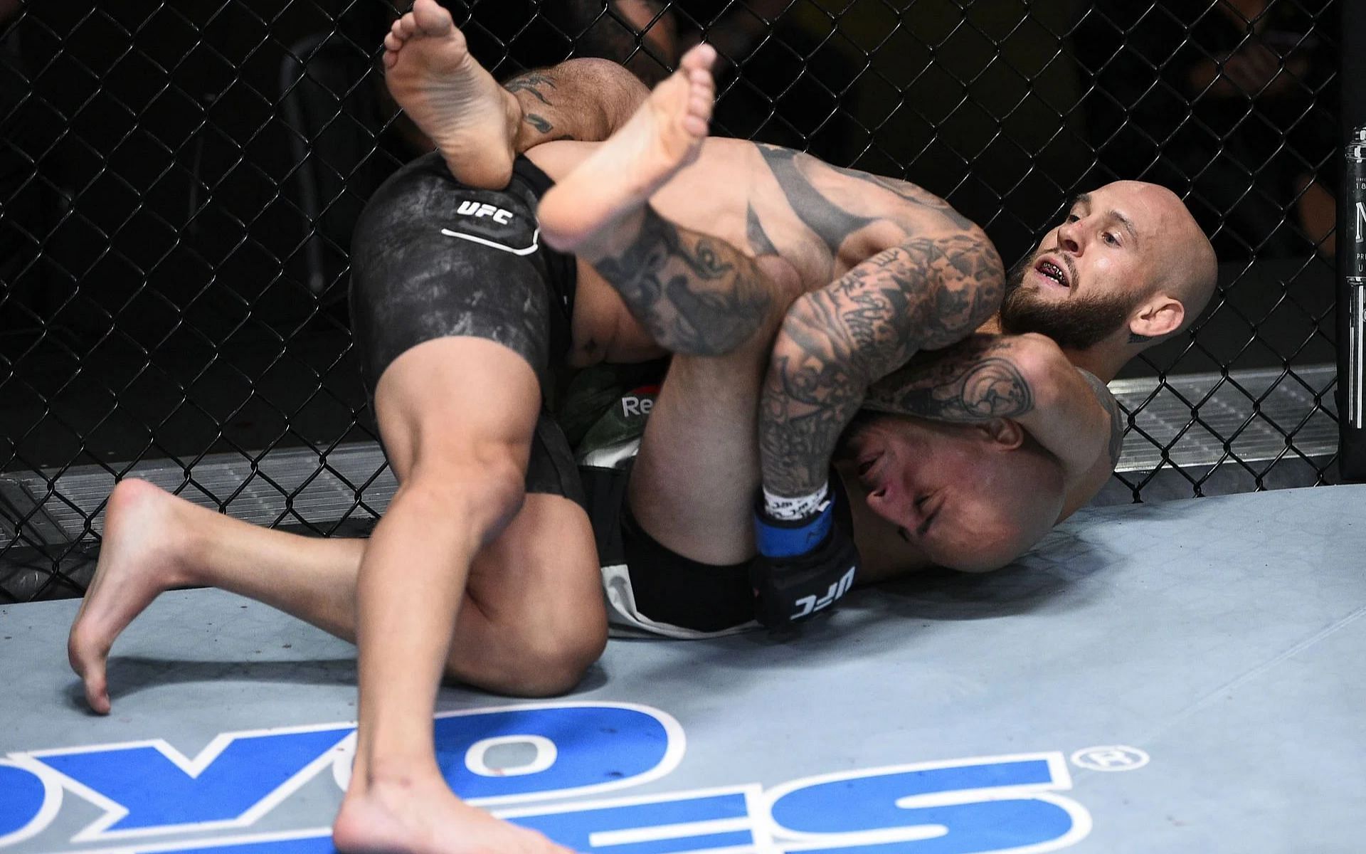 An example of the guillotine choke being used in the UFC [Image Credit: Getty]