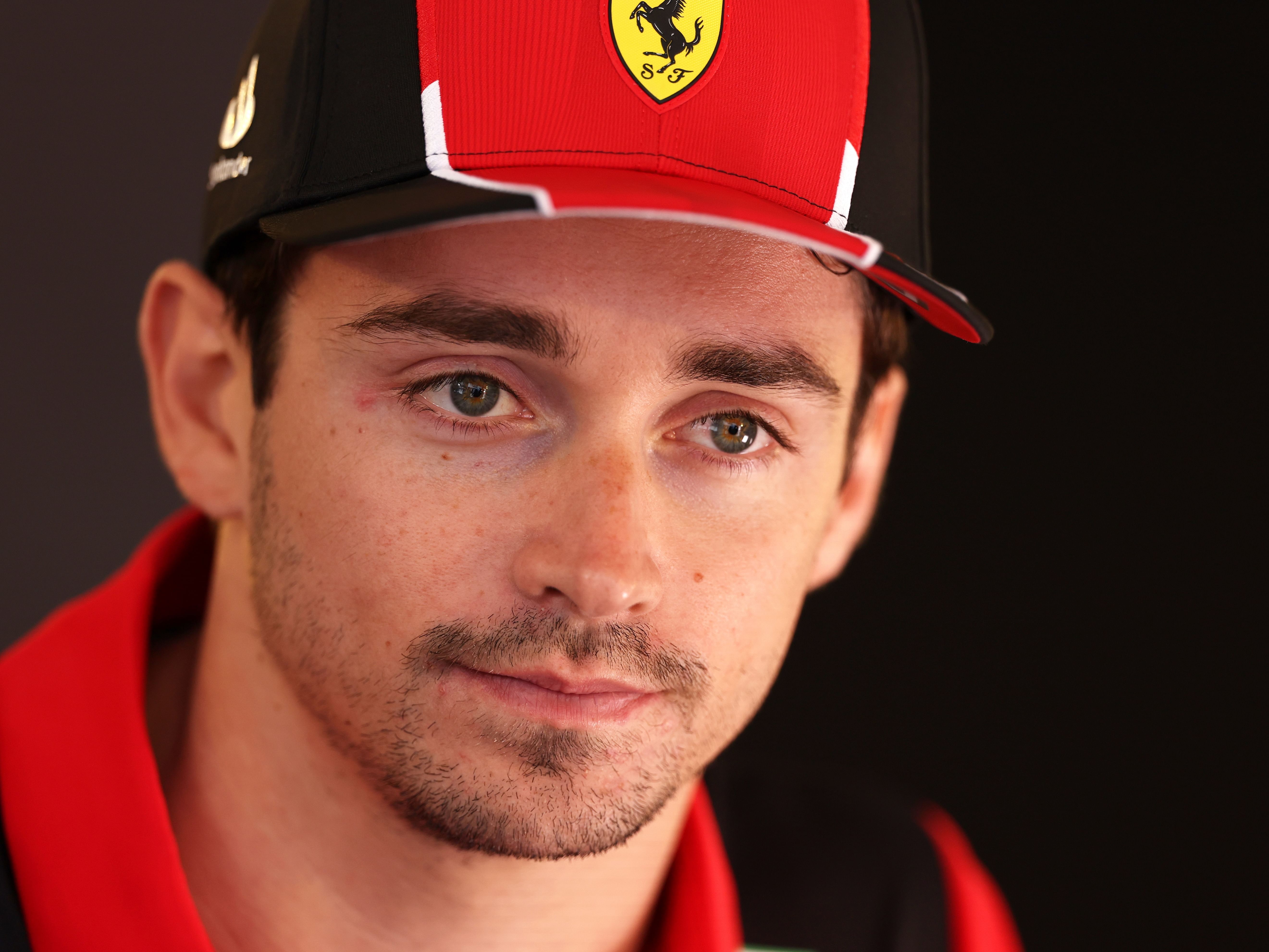 Charles Leclerc looks on in the paddock during previews ahead of the 2023 F1 Azerbaijan Grand Prix. (Photo by Alex Pantling/Getty Images)