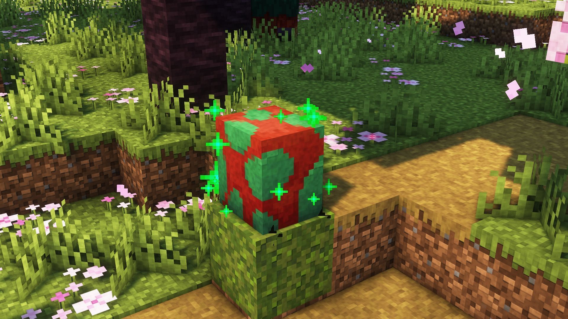 A sniffer egg placed on a moss block (Image via Mojang)