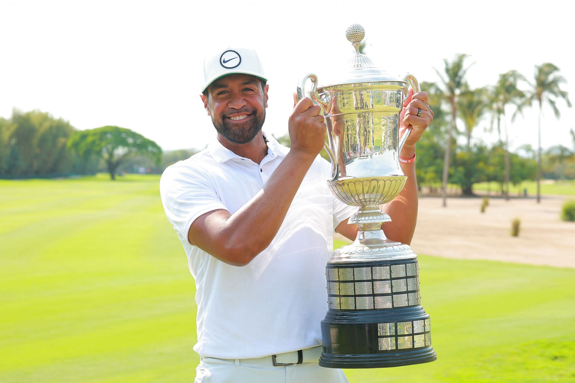 Tony Finau holding his trophy of the 2023 Mexico Open at Vidanta (Image via Getty).