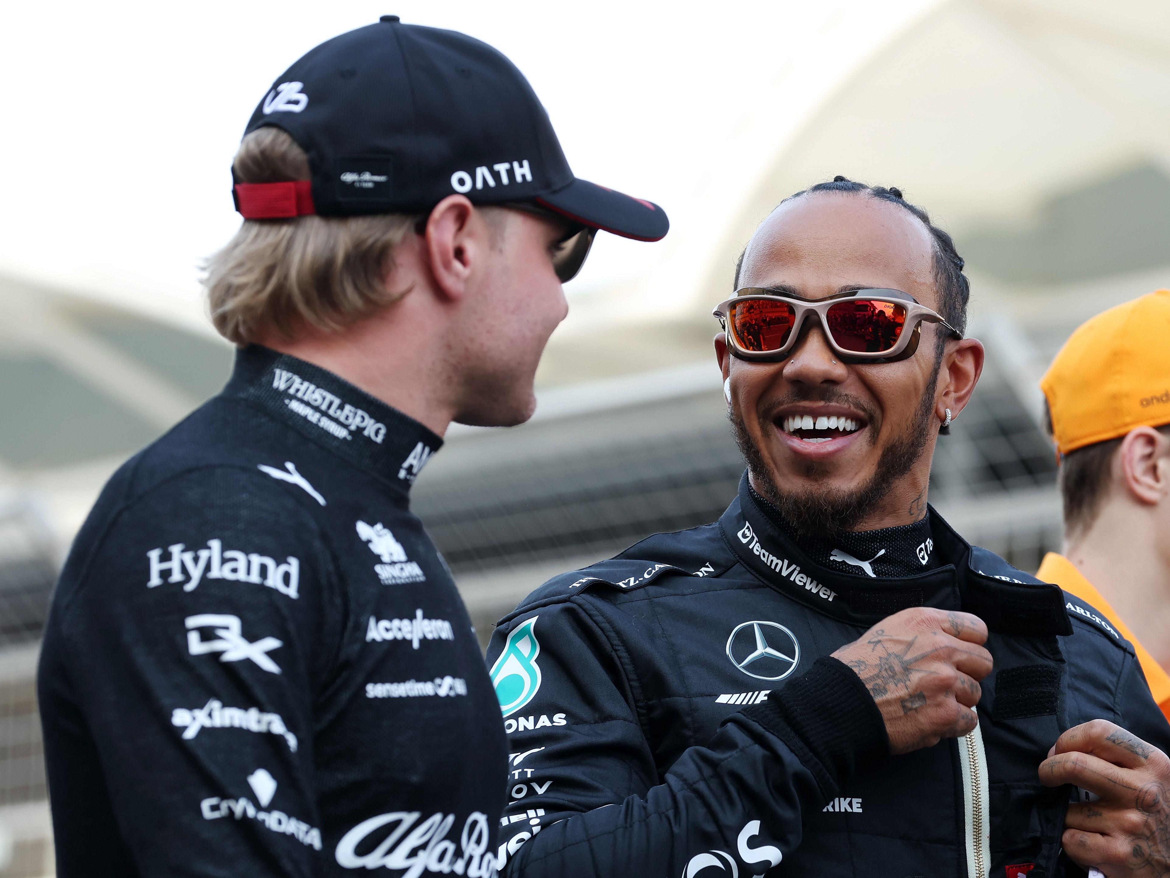 F1 Grand Prix of BahrainLewis Hamilton talks with Valtteri Bottas prior to the 2023 F1 Bahrain Grand Prix. (Photo by Lars Baron/Getty Images)