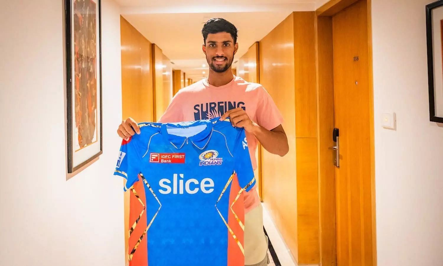 Tilak Verma posing with MI&#039;s lavender jersey ahead of their game against KKR