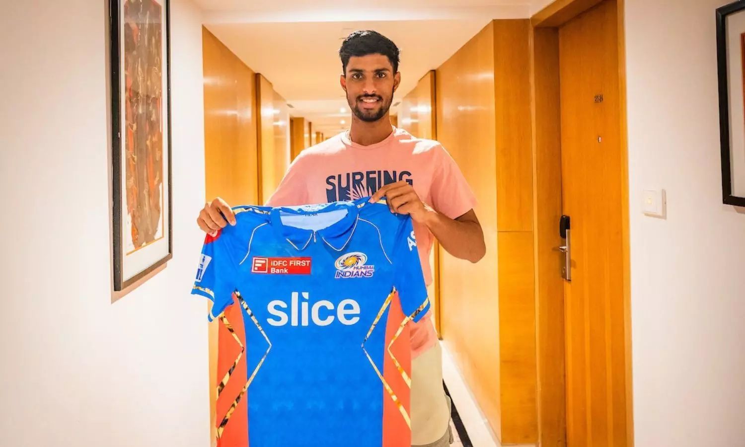 Tilak Verma posing with MI&#039;s lavender jersey ahead of their game against KKR