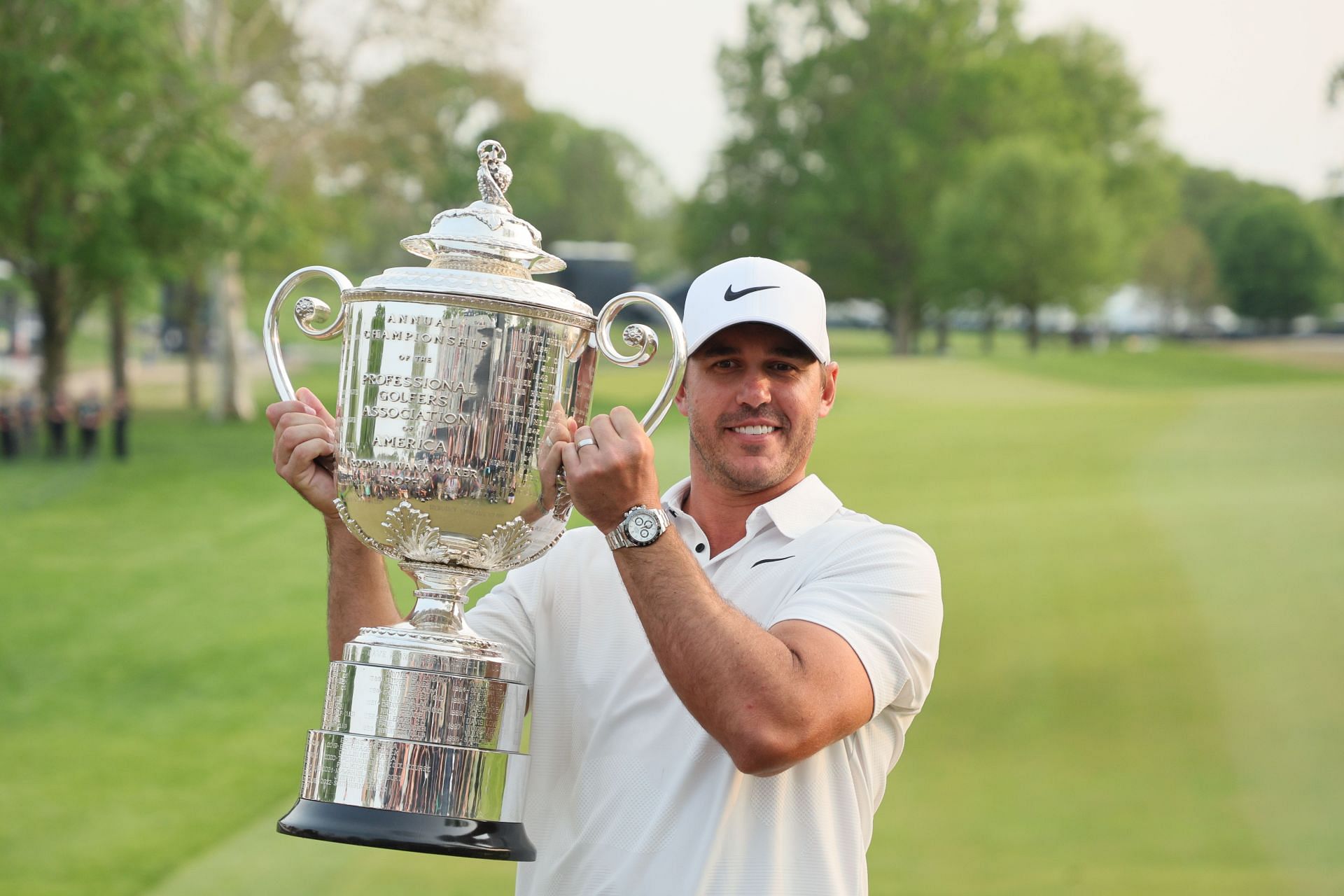 Brooks Koepka lifts the PGA Championship 2023 trophy