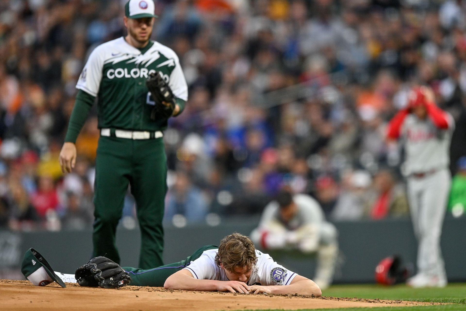Rockies pitcher Ryan Feltner leaves game after 'missile' to head by  Phillies' Nick Castellanos