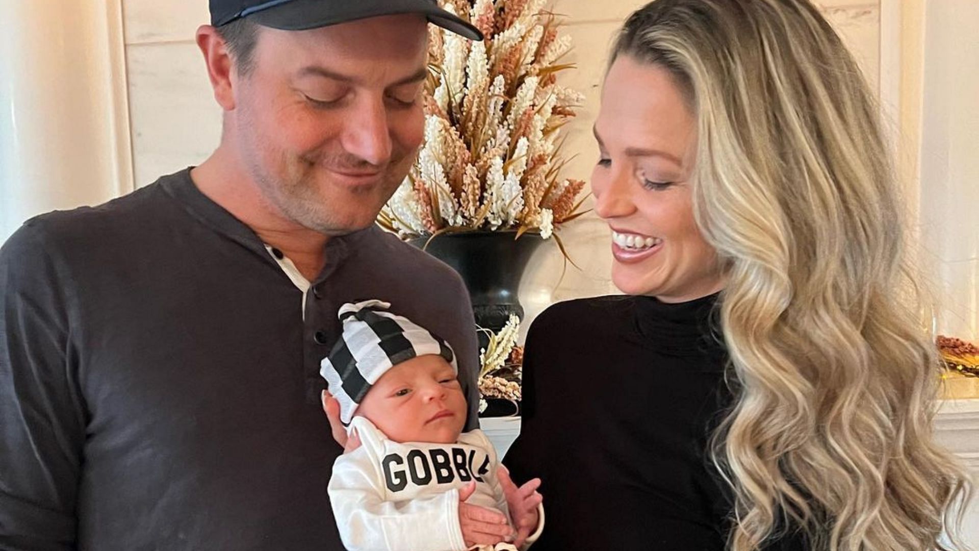 Allie LaForce, TNT sports reporter with husband and MLB picther, Joe Smith holding their son, Jake. (Image Source:  allie.laforce on Instagram) 