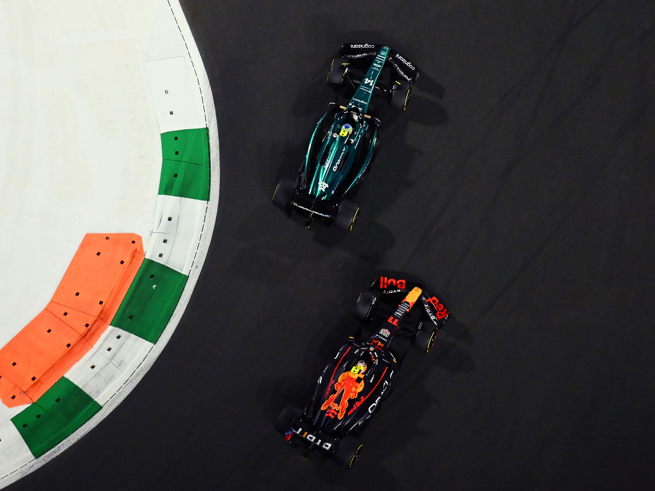 F1 Grand Prix of Saudi ArabiaFernando Alonso (14) leads Sergio Perez (11) during the 2023 F1 Saudi Arabian Grand Prix. (Photo by Clive Mason/Getty Images)