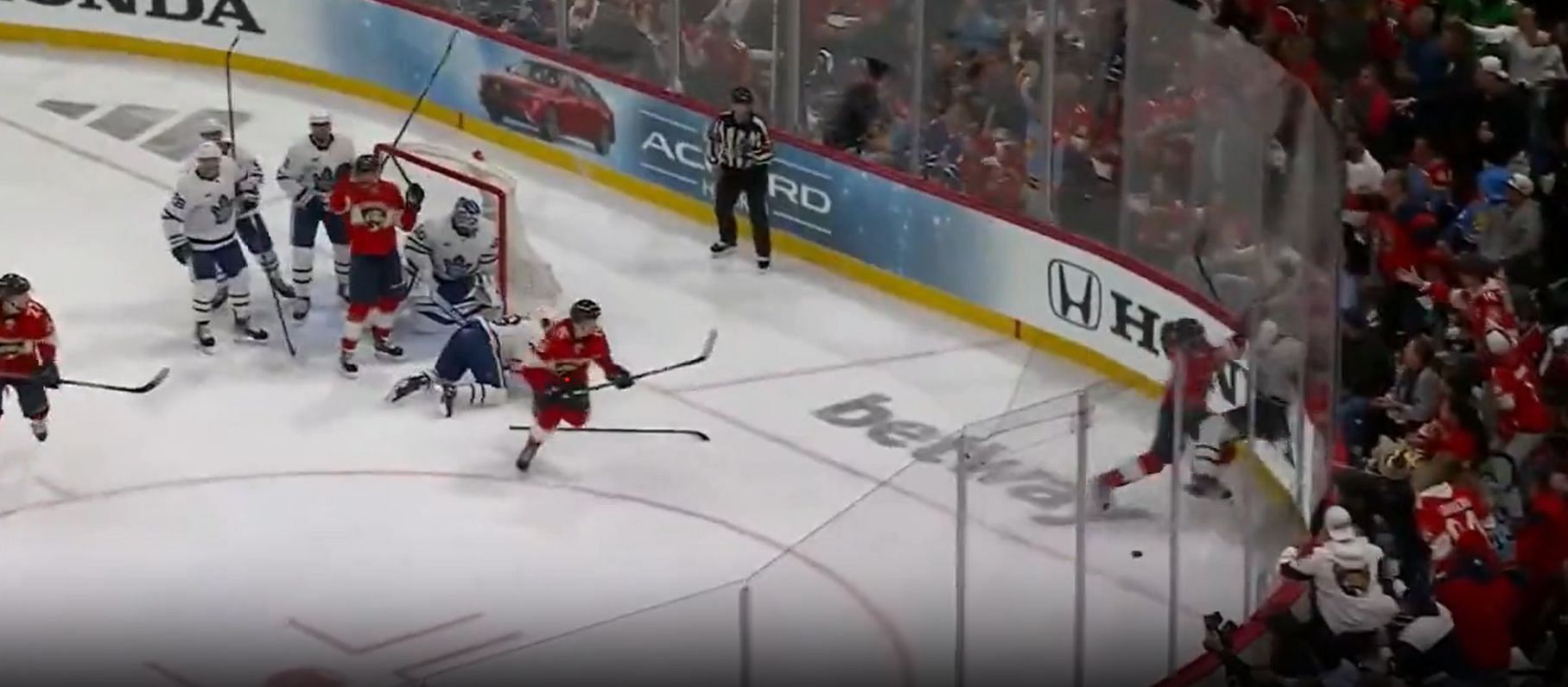 David Kampf slammed into the boards by Radko Gudas in bone-crushing hit