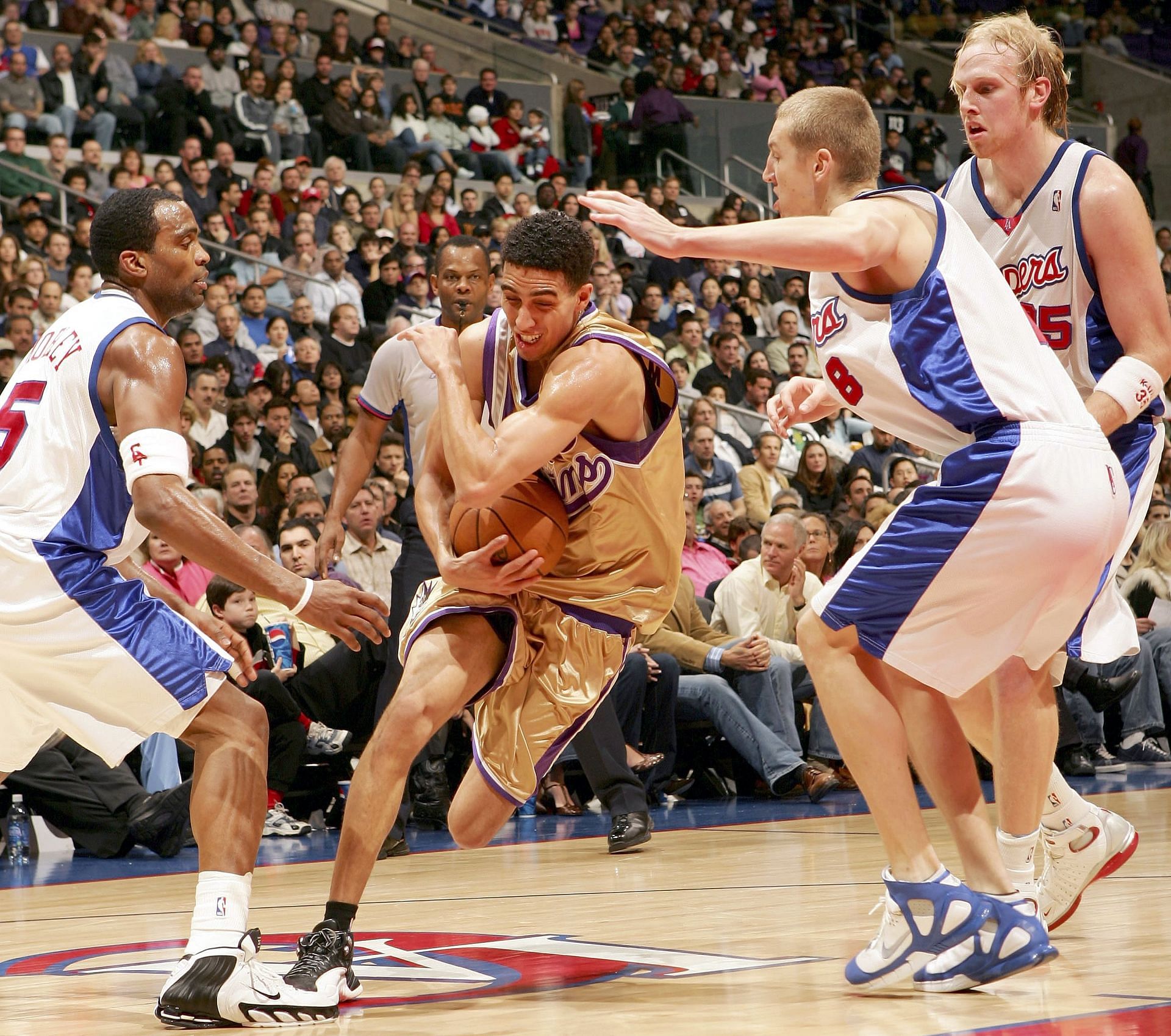 Korolev (right) was among the youngest NBA players ever (Image via Getty Images)