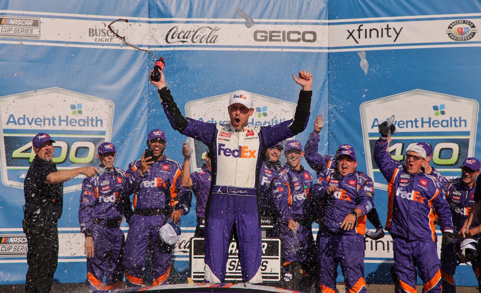 Denny Hamlin wins in an epic battle