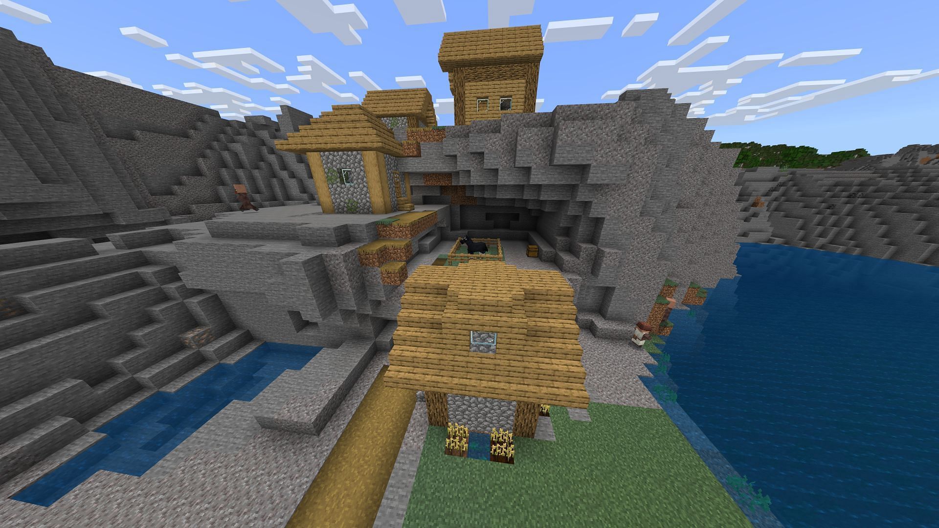 The exposed chest near this Minecraft seed&#039;s spawn village may have a few diamonds worth snagging (Image via Mojang)