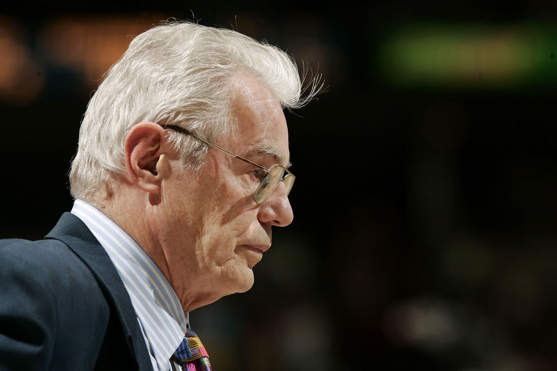 Doug Moe looks on at a Denver Nuggets game