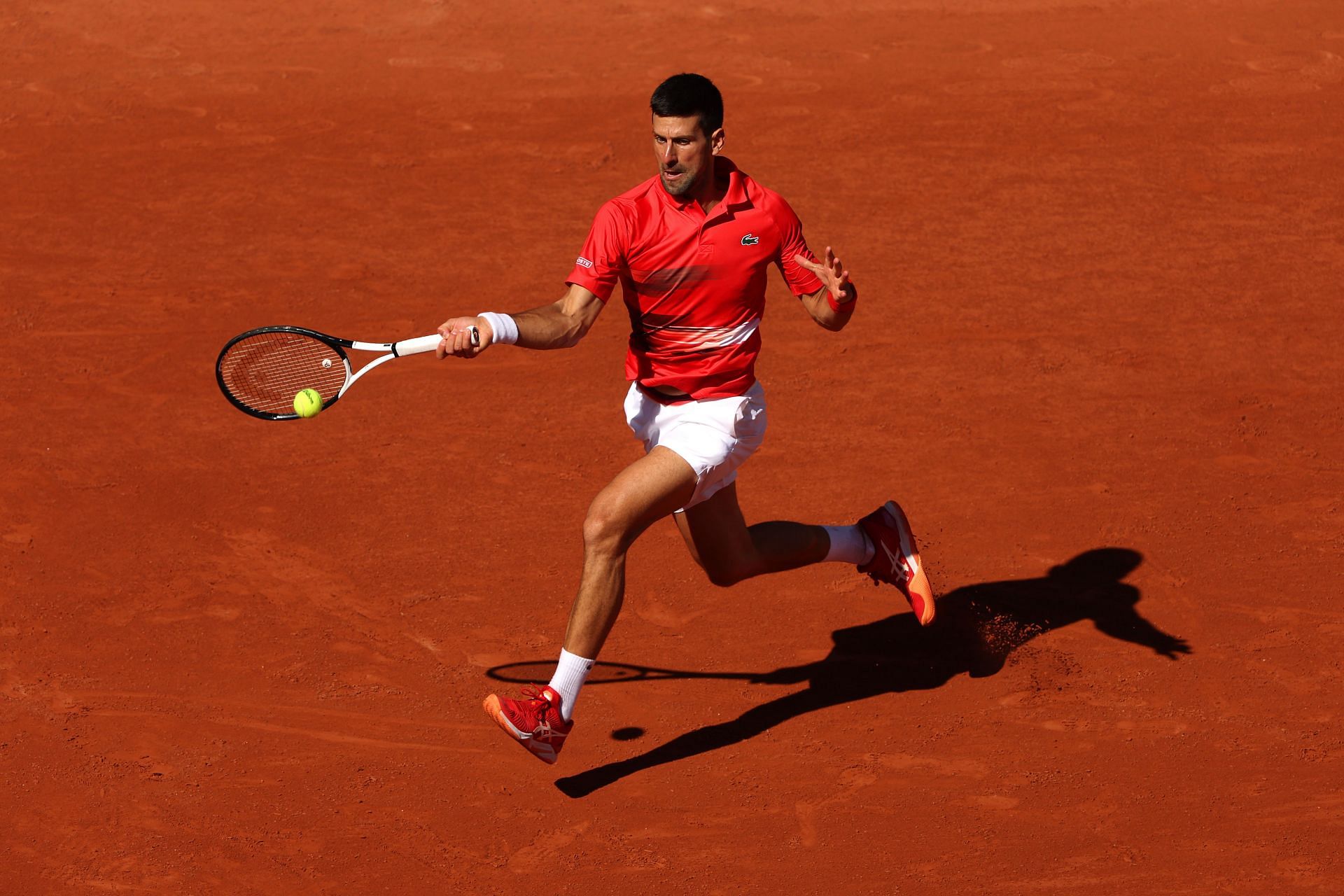 Novak Djokovic in action at the 2022 French Open.
