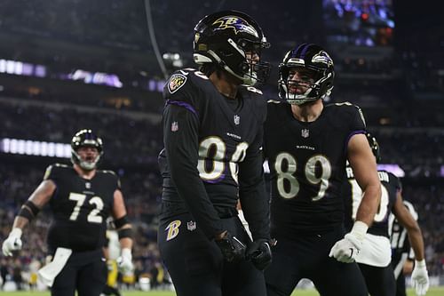 Isaiah Likely #80 of the Baltimore Ravens celebrates a touchdown reception with Mark Andrews #89 against the Pittsburgh Steelers - 2022 NFL regular season