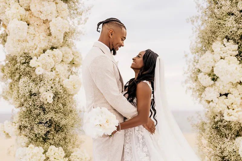 Biles and Owens flew in a special guest for their exotic wedding in Cabo. Photo via Jonathan Owens/Twitter.