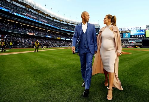 Derek and his Wife Hannah Davis walk off the field after the retirement ceremony of Derek Jeter's number 2 jersey at Yankee Stadium on May 14, 2017, in New York City. (Photo by Al Bello/Getty Images)