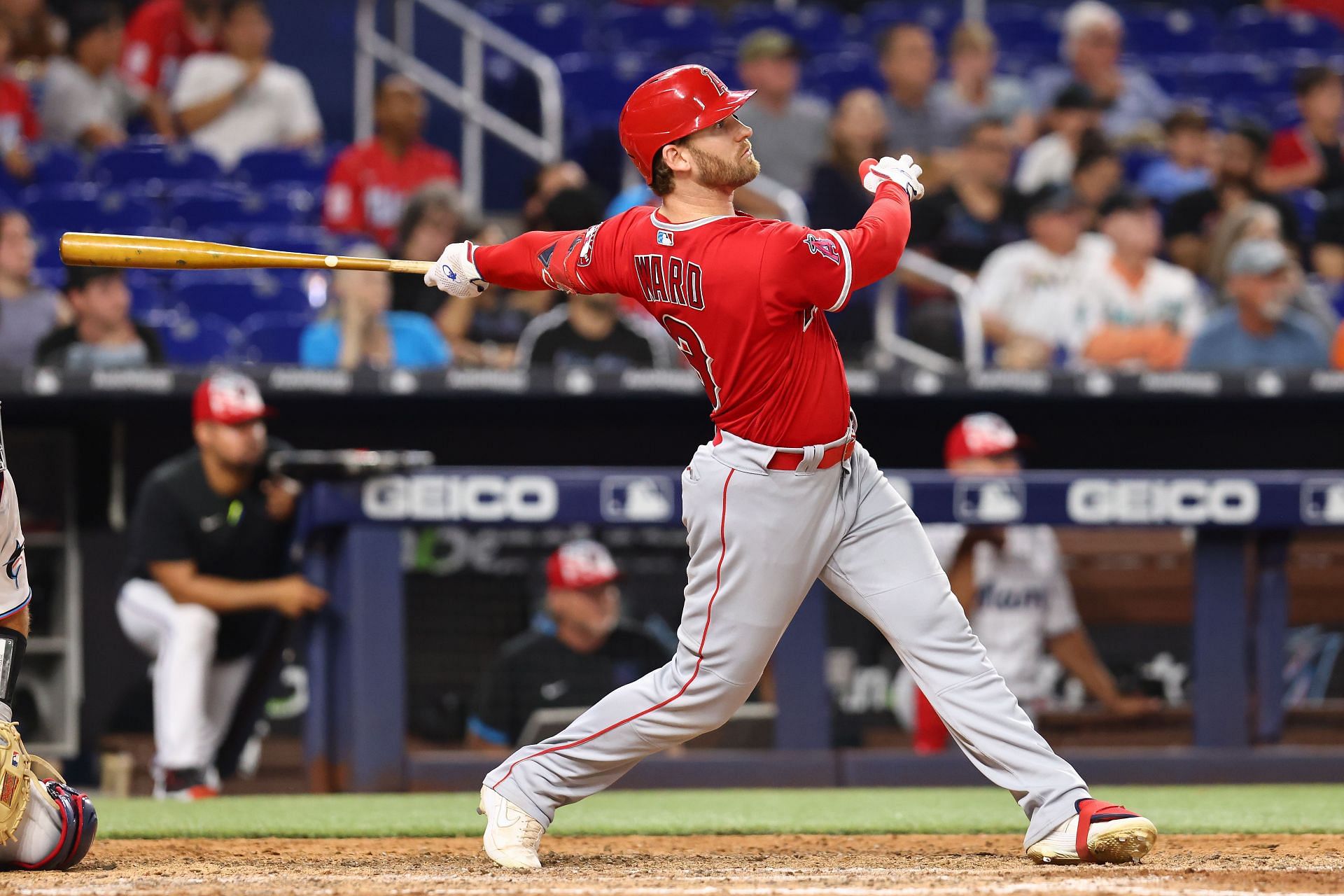 Taylor Ward #3 of the Los Angeles Angels hits a RBI sacrifice fly against the Miami Marlins at loanDepot park