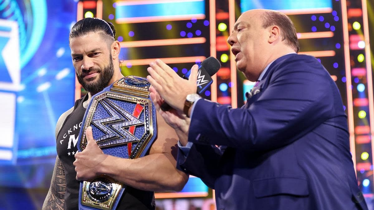 Paul Heyman and Roman Reigns