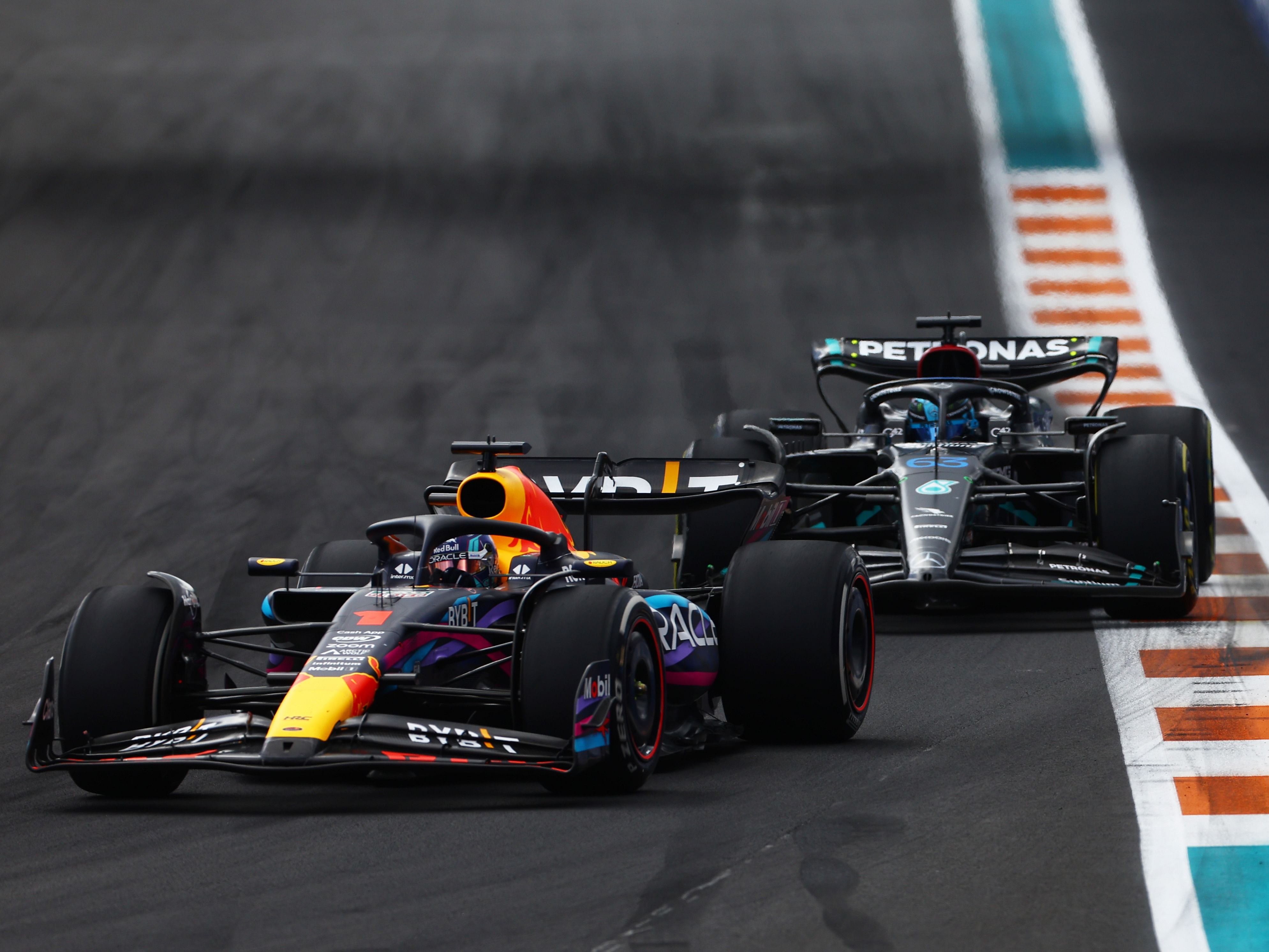 Max Verstappen (1) leads George Russell (63) during the 2023 F1 Miami Grand Prix. (Photo by Mark Thompson/Getty Images)
